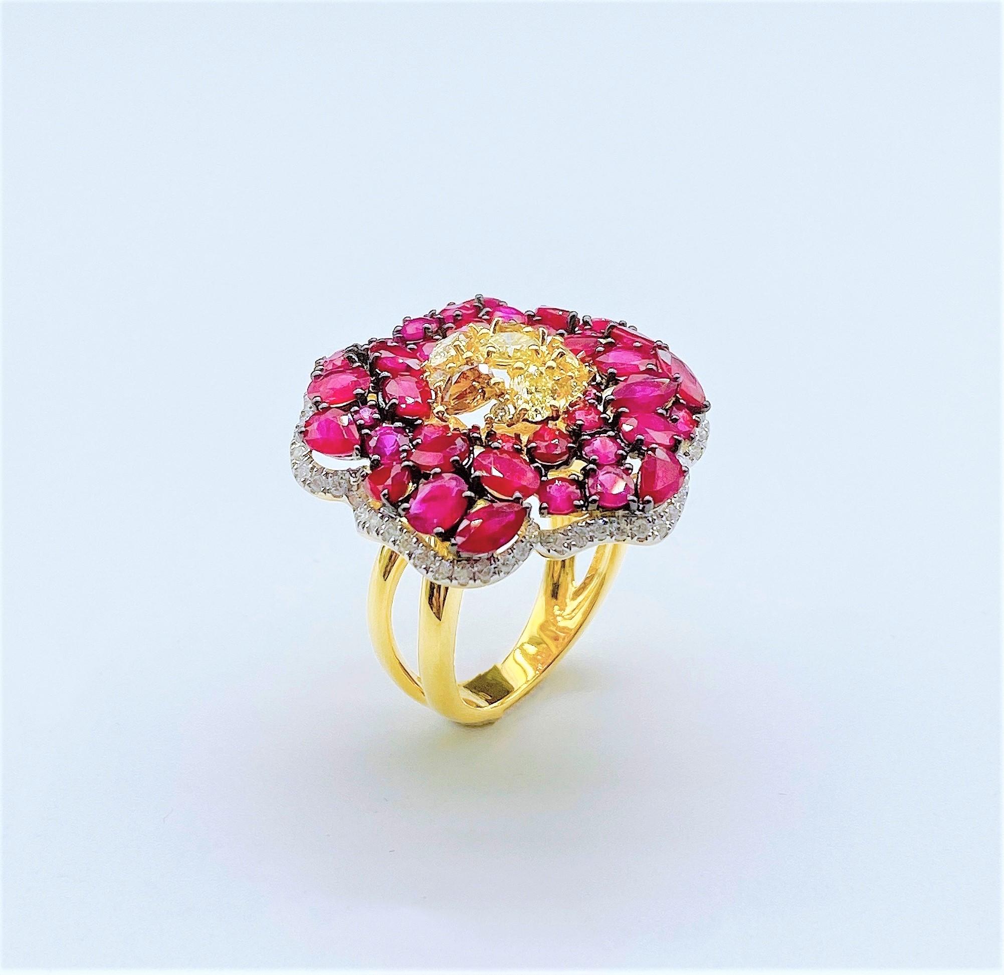 The Following Item we are offering is a Rare Important Radiant 18KT Gold Large Rare Fancy Gorgeous Ruby Ring. Ring is comprised of Gorgeous Rubies Framed with White Diamonds and adorned with Magnificent Fancy Yellow Glittering Diamonds at