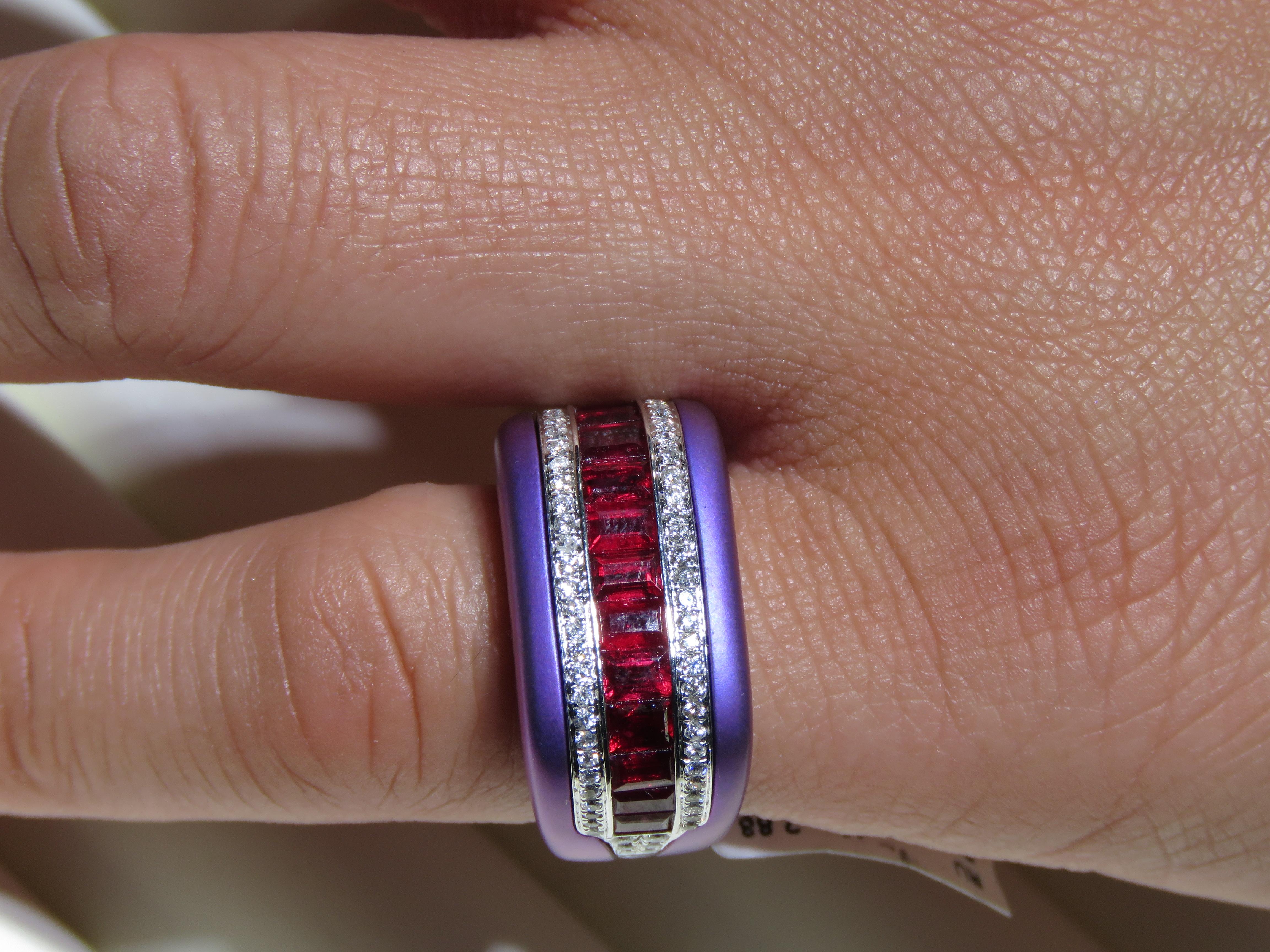 The Following Item we are offering is this Rare Important Radiant 18KT Gold and Titanium Gorgeous Glittering and Sparkling Magnificent Fancy Emerald Cut Ruby and Fancy Diamond Ring. Ring Contains approx 3.25CTS of a Beautiful Fancy Cut Rubies framed