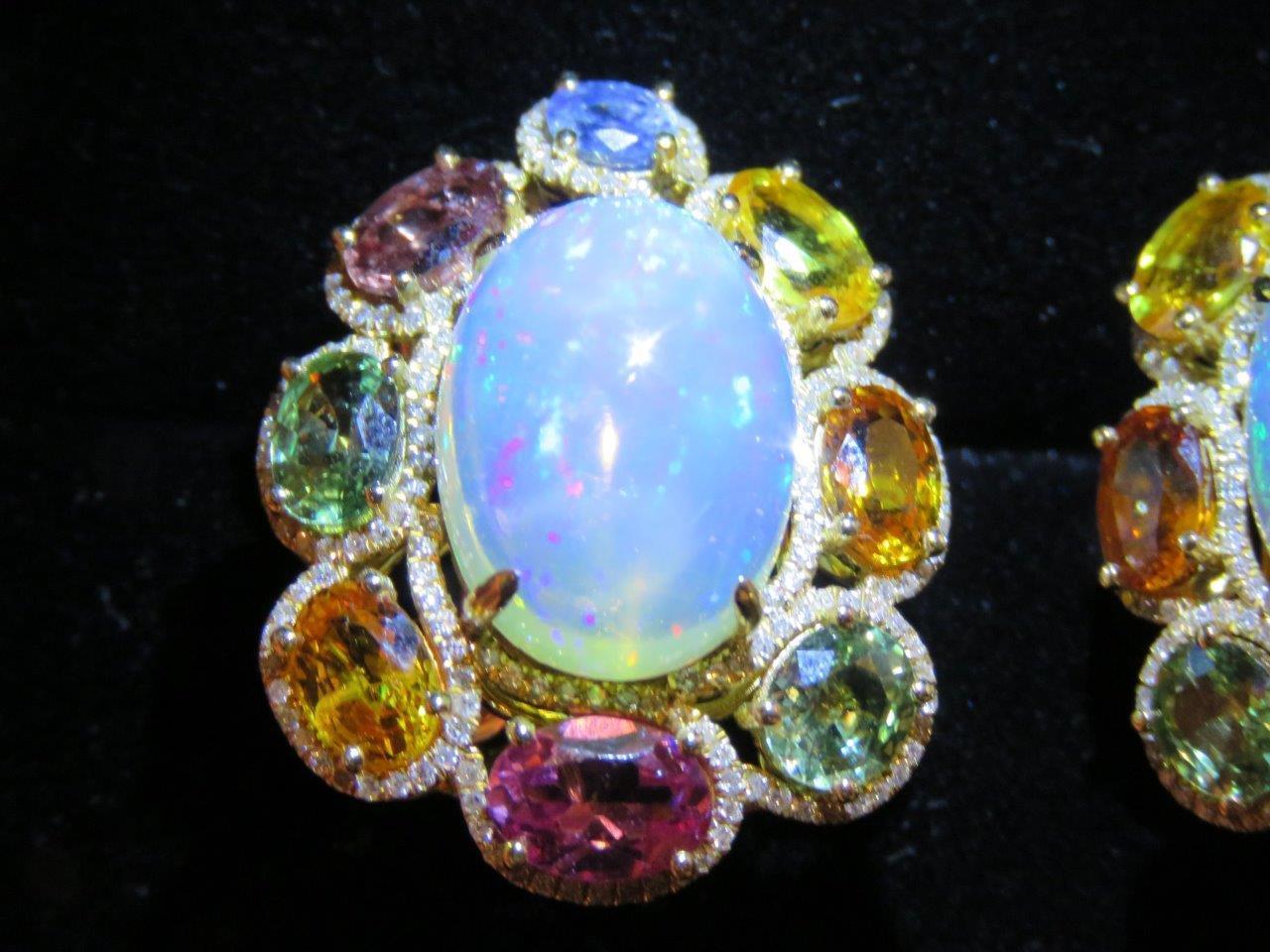 The Following Items we are offering is a Rare Important Radiant Pair of 18KT Gold Glistening Magnificent Large Fiery Opal Gorgeous Multi Rainbow Sapphire and Diamond Earrings. Stones are Very Clean and Extremely Fine! Approx T.C.W for Earrings:

2