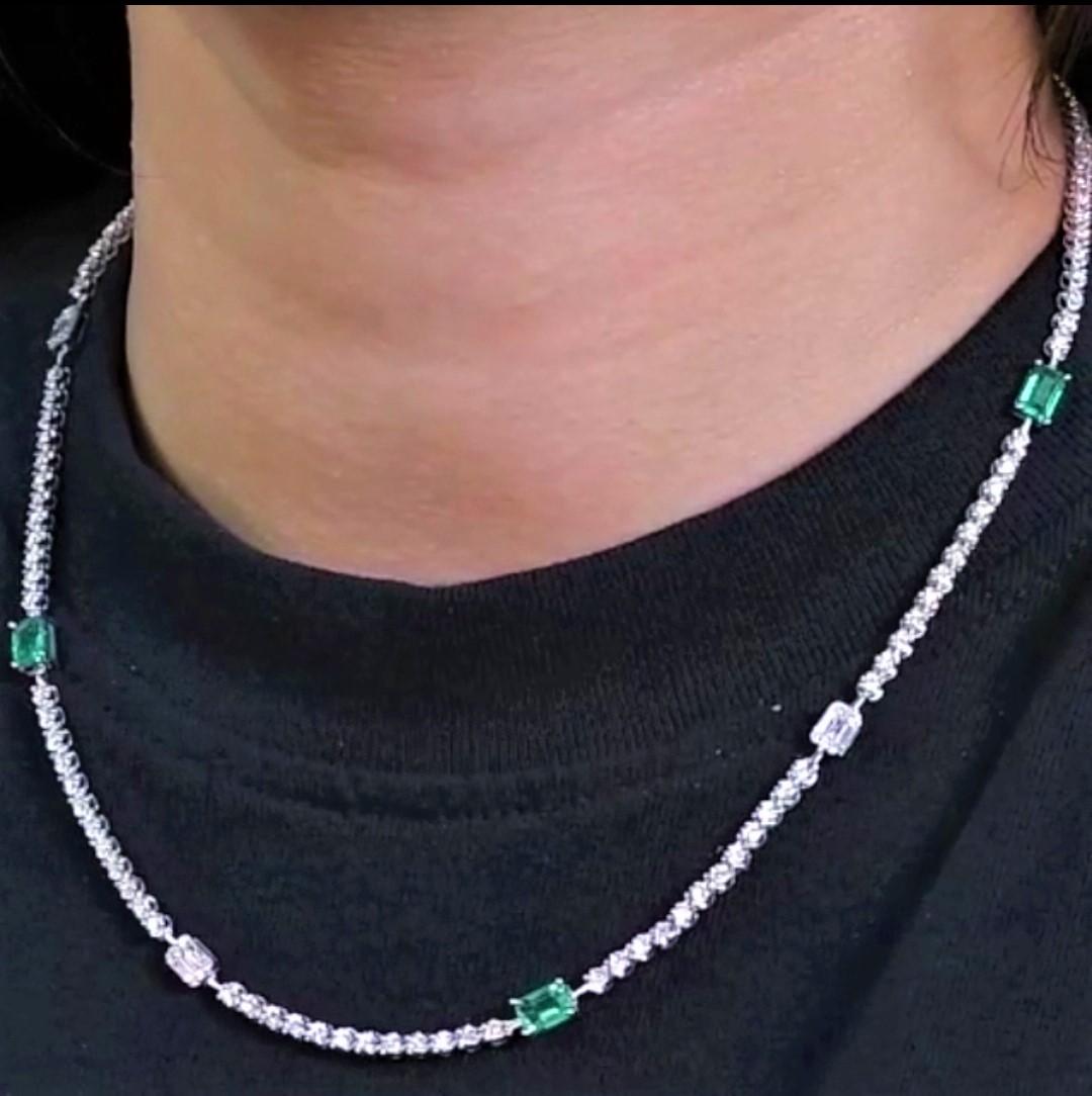 The Following Items we are offering is a Rare Important Radiant 18KT GOLD LARGE EMERALD AND FANCY BAGUETTE DIAMOND NECKLACE. Necklace is comprised with a Large Finely Set Gorgeous Emeralds and Rare Fancy Baguette Cut Trillion and Round Glittering
