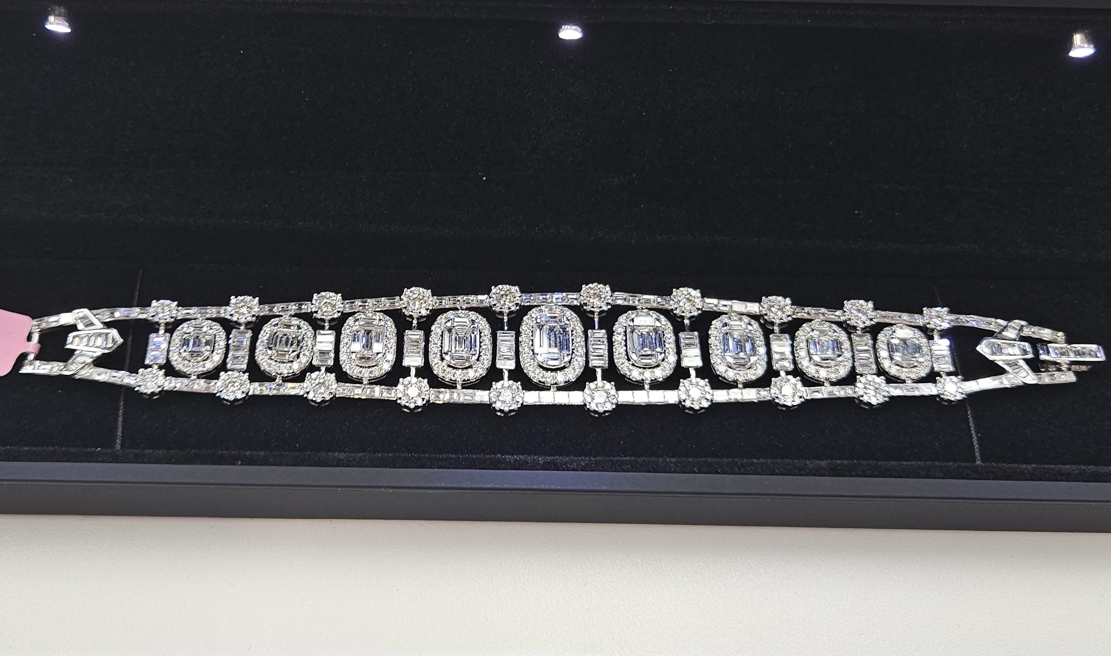 The Following Item we are offering is this Beautiful Rare Important 18KT White Gold Brilliant White Diamond Fancy Elaborate Tennis Bracelet. Bracelet is comprised of approx 17CTS of Magnificent Rare Gorgeous Rare Fancy Glittering Diamonds with Large