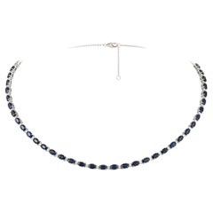 Collier fantaisie de 16 000 $ en or 18 carats avec grand saphir bleu pailleté et diamants