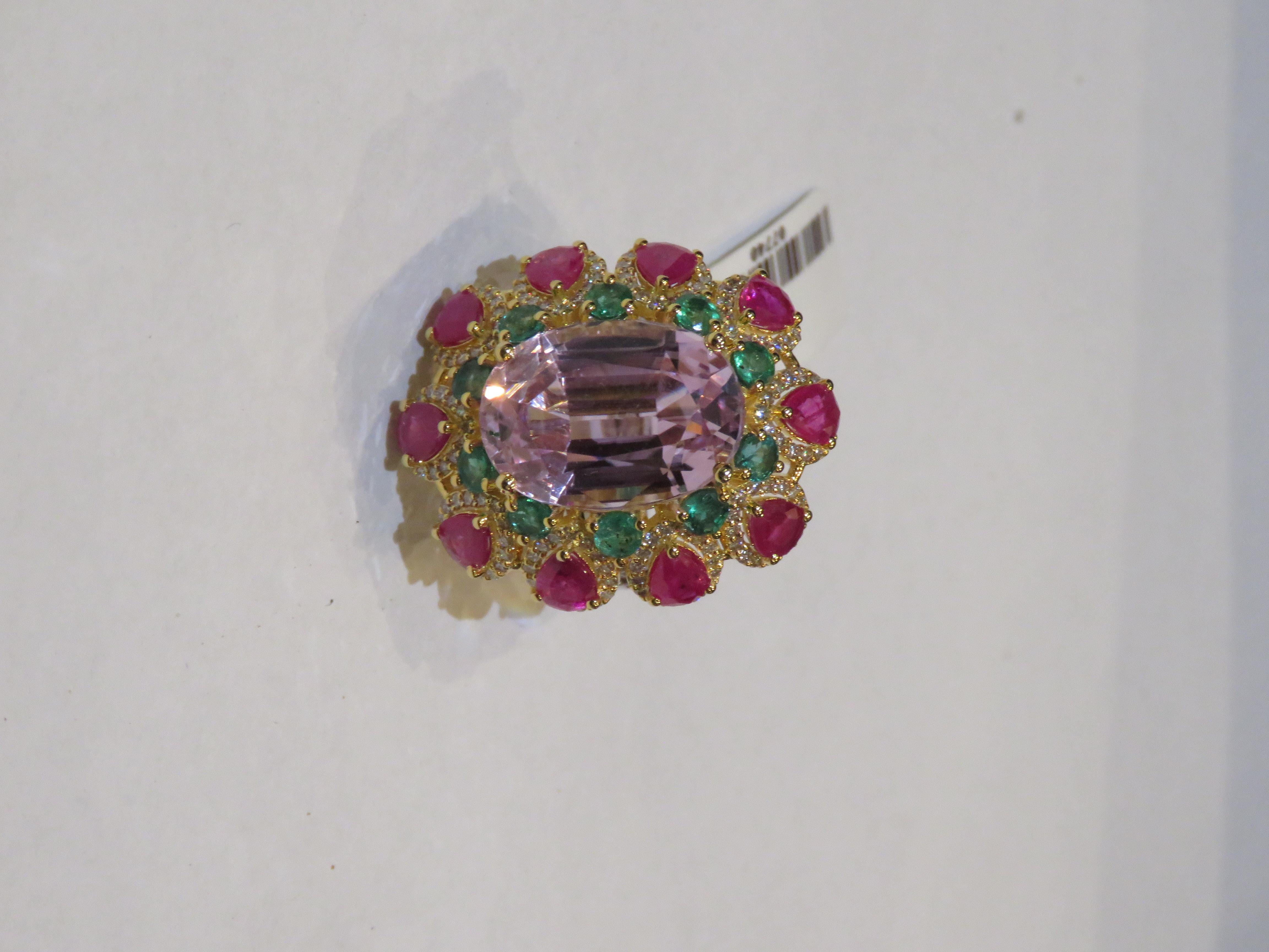 The Following Item we are offering is this Rare Important Radiant 18KT Gold Winston Style LARGE Glittering and Sparkling Magnificent Fancy Kunzite and Fancy Ruby and Green Sapphire White Diamond Ring. Ring Contains a Beautiful Fancy Shaped Oval Cut