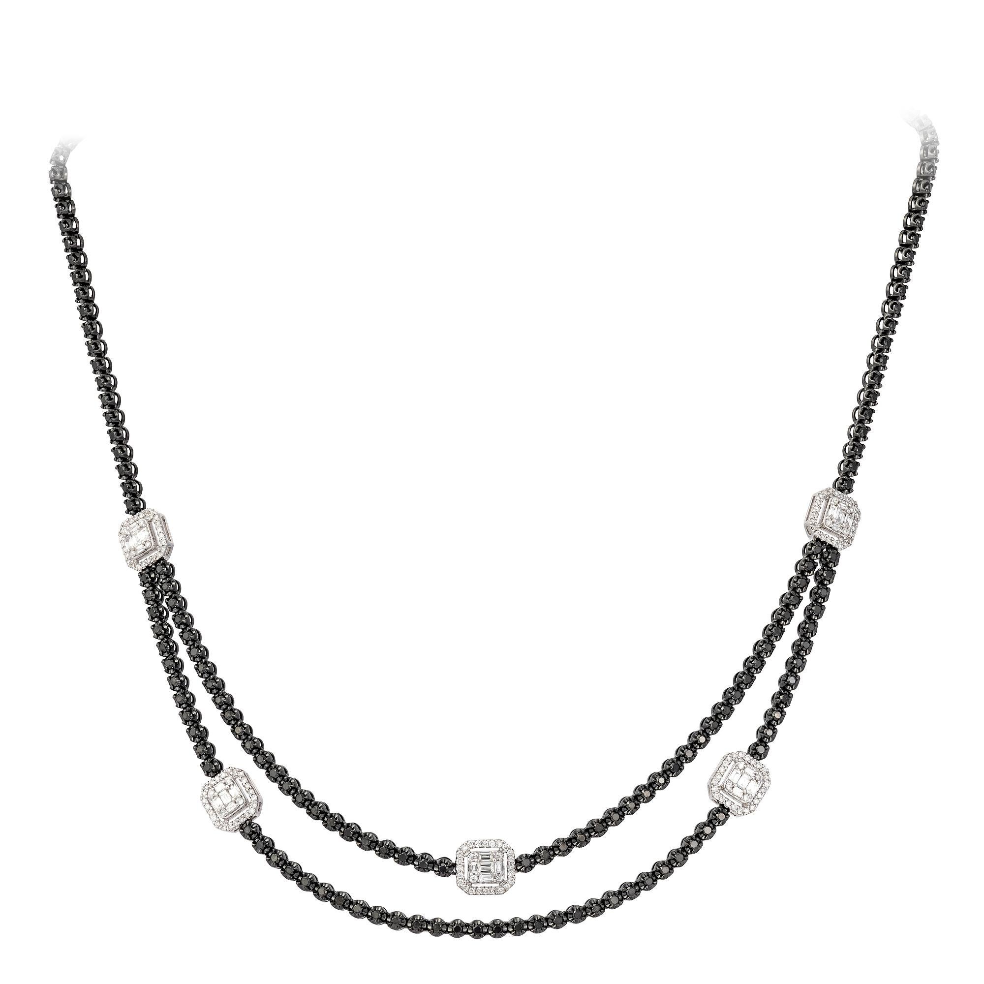 The Following Item we are offering is a Rare 18KT Gold Rare Fancy Black Diamond White Diamond Baguette Double Strand Necklace. Beautifully comprised of Finely Set Gorgeous Round Black Diamonds and Adorned with Large Baguette Cut White Diamond