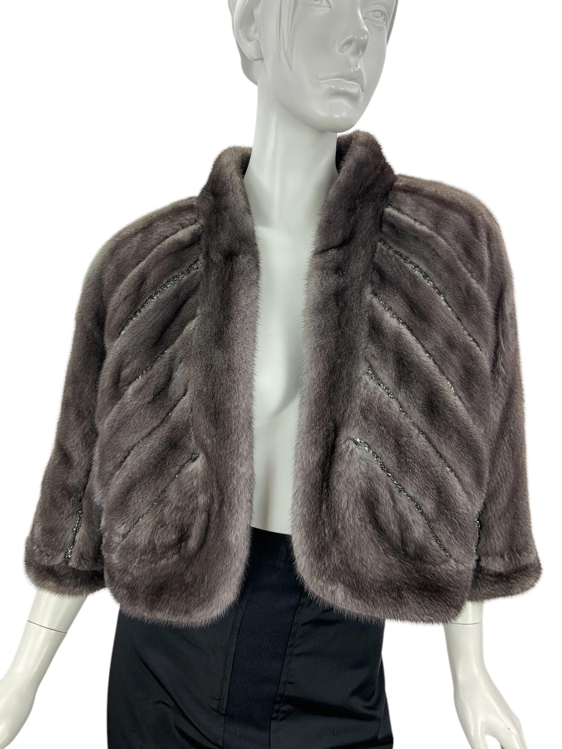 Oscar de la Renta Iris Mink Embroidered Bolero Jacket
F/W 2009 Collection
Designer size - M
Real, gray color with touch of blue, mink exclusively embellished with silver tone chain. Bolero/Jacket made for cool days and has filling for warm. 3/4