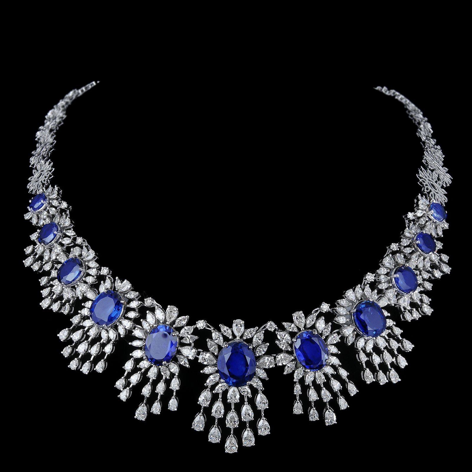 The Following Item we are offering is a Rare Important Spectacular and Brilliant White Gold Large Gorgeous Fancy Blue Sapphire Diamond Draped Necklace. Necklace consists of Rare Fine Magnificent Glittering Blue Sapphires and Gorgeous Diamonds!