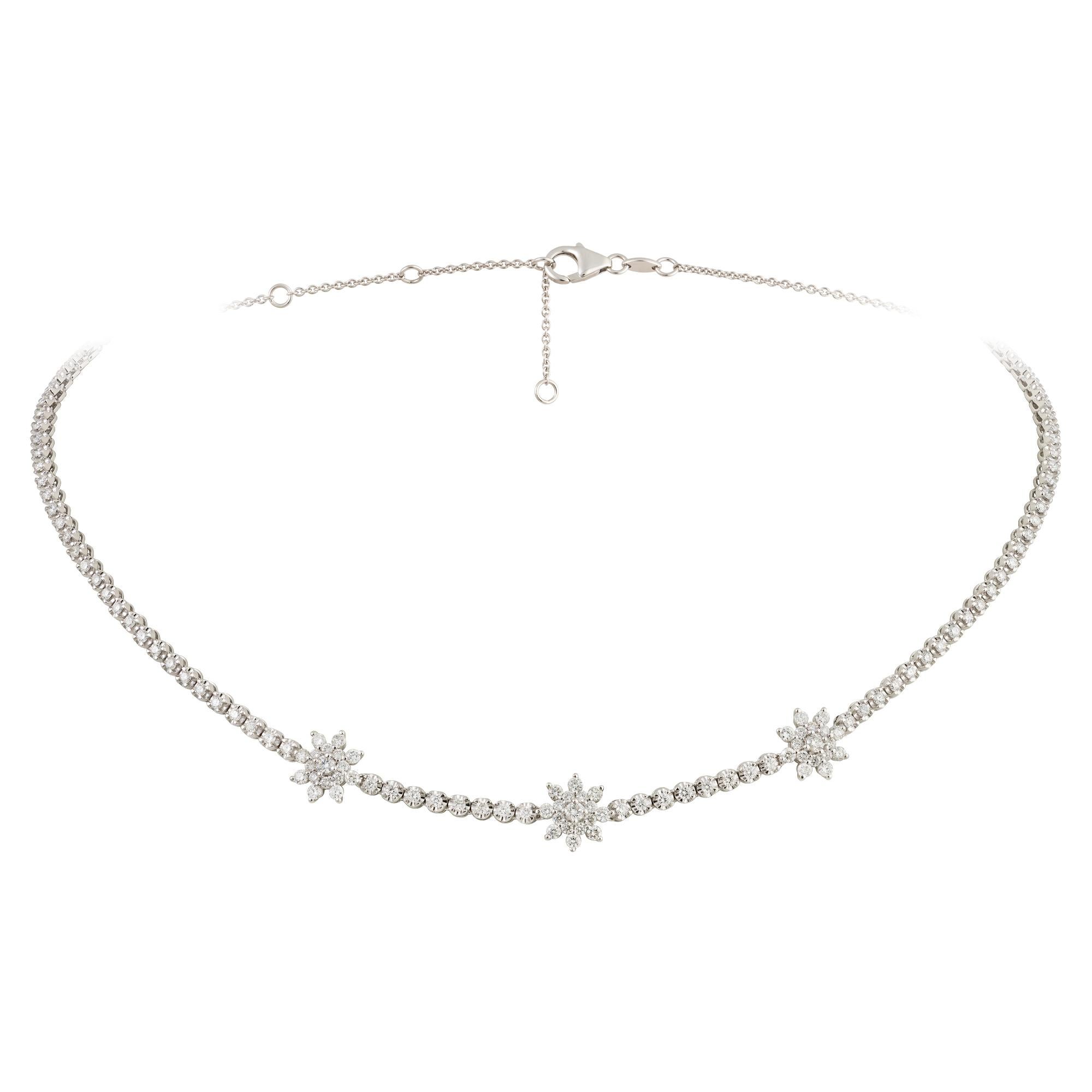 The Following Item we are offering is a Rare 18KT White Gold Triple Flower Diamond Strand Necklace. Necklace is comprised of Finely Set Gorgeous Glittering Diamond in a strand and 3 Large Cluster of Flowers.!! T.C.W. Approx 2.25CTS!! This Gorgeous