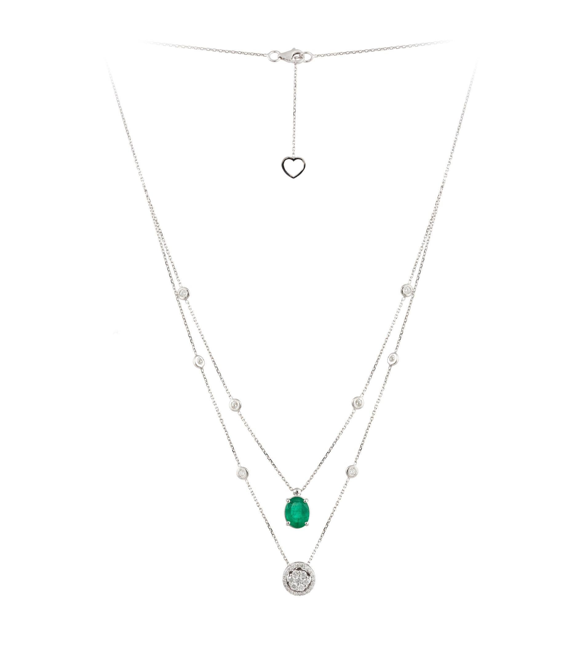 The Following Item we are offering is a Rare 18KT White Gold Round Diamond and Oval Emerald Necklace. Necklace is comprised of Finely Set Gorgeous Glittering Round Diamonds with a Large Gorgeous Green Emerald!!! T.C.W. Approx 2.50CTS!! The Emerald