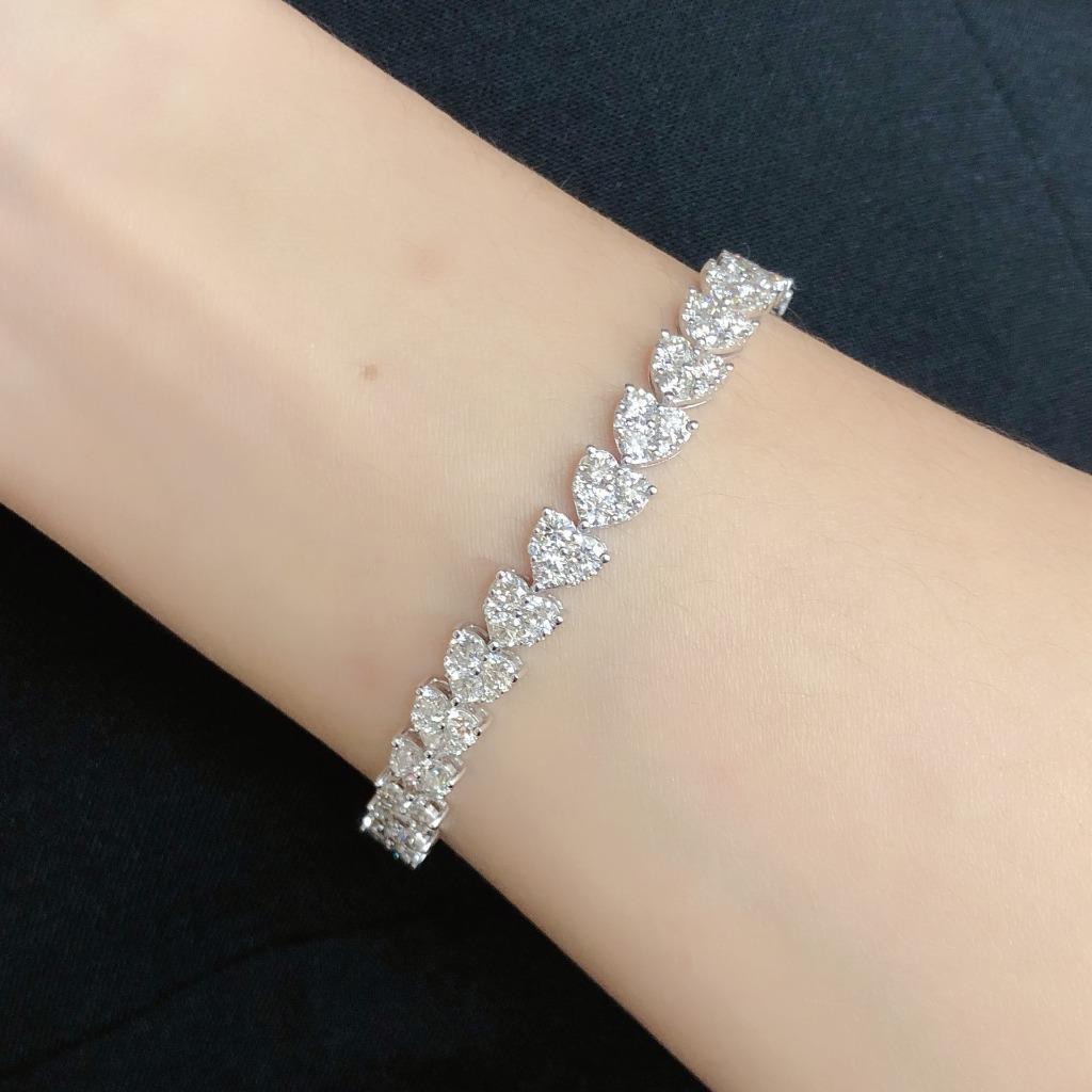 Round Cut NWT $19, 775 18KT Gold Rare Magnificent 7.50ct Diamond Heart Tennis Bracelet For Sale