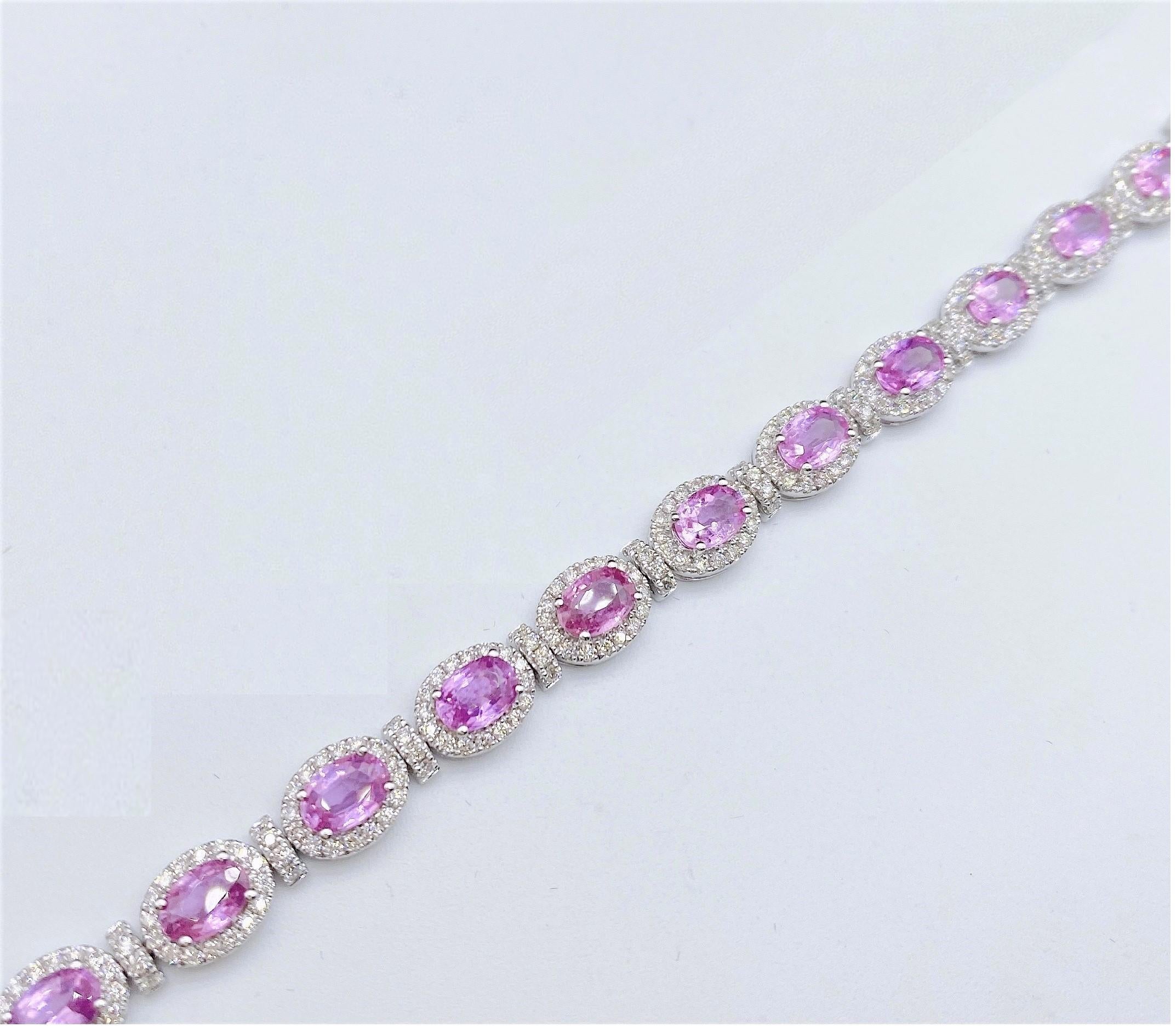 The Following Item we are offering is this Rare Important Radiant 18KT Gold Gorgeous Glittering and Sparkling Magnificent Fancy Oval Shaped Rare Pink and Diamond Bracelet. Bracelet Contains approx 10.50CTS of Beautiful Fancy Gorgeous Oval Cut Pink