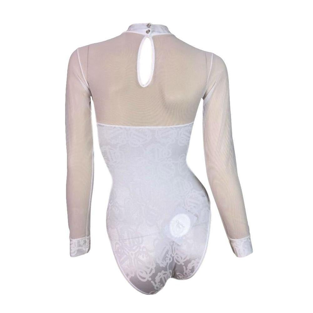 DESIGNER: 1990's Christian Dior

Please contact for more information and/or photos.

CONDITION: Unworn with tags

FABRIC: Nylon blend

COUNTRY MADE: Spain

SIZE: 70B- like XS/S with B/C cup

MEASUREMENTS; provided as a courtesy only- not a guarantee