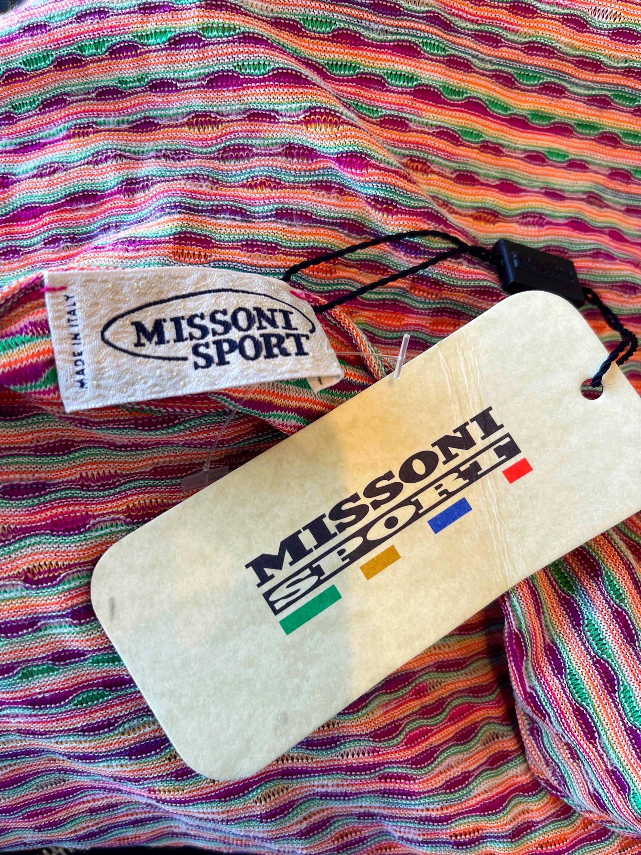 Beautiful new with original tags MISSONI SPORT colorful cotton and rayon t-shirt ! Features vibrant colors of pink, purple, green, and orange. Simply slips over the head and stretches to fit. 
Made in Italy
Model is 5’8, and US Size 6
Marked Size 44