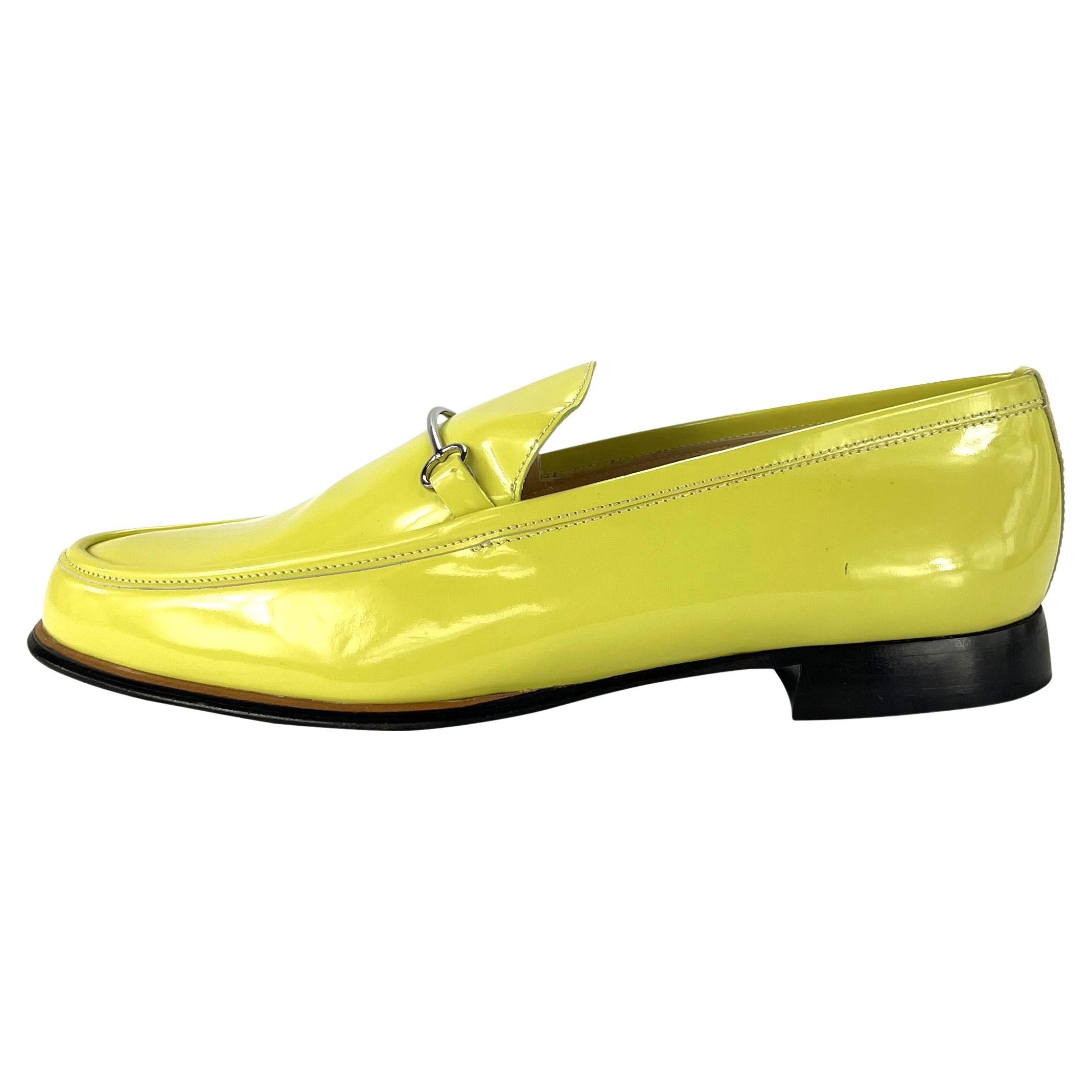 TheRealList presents: a pair of neon yellow patent leather Gucci loafers, designed by Tom Ford. From the late 1990s, these 'new old stock' loafers have never been worn and are in perfect condition. These fabulous and bright slip-on loafers feature a