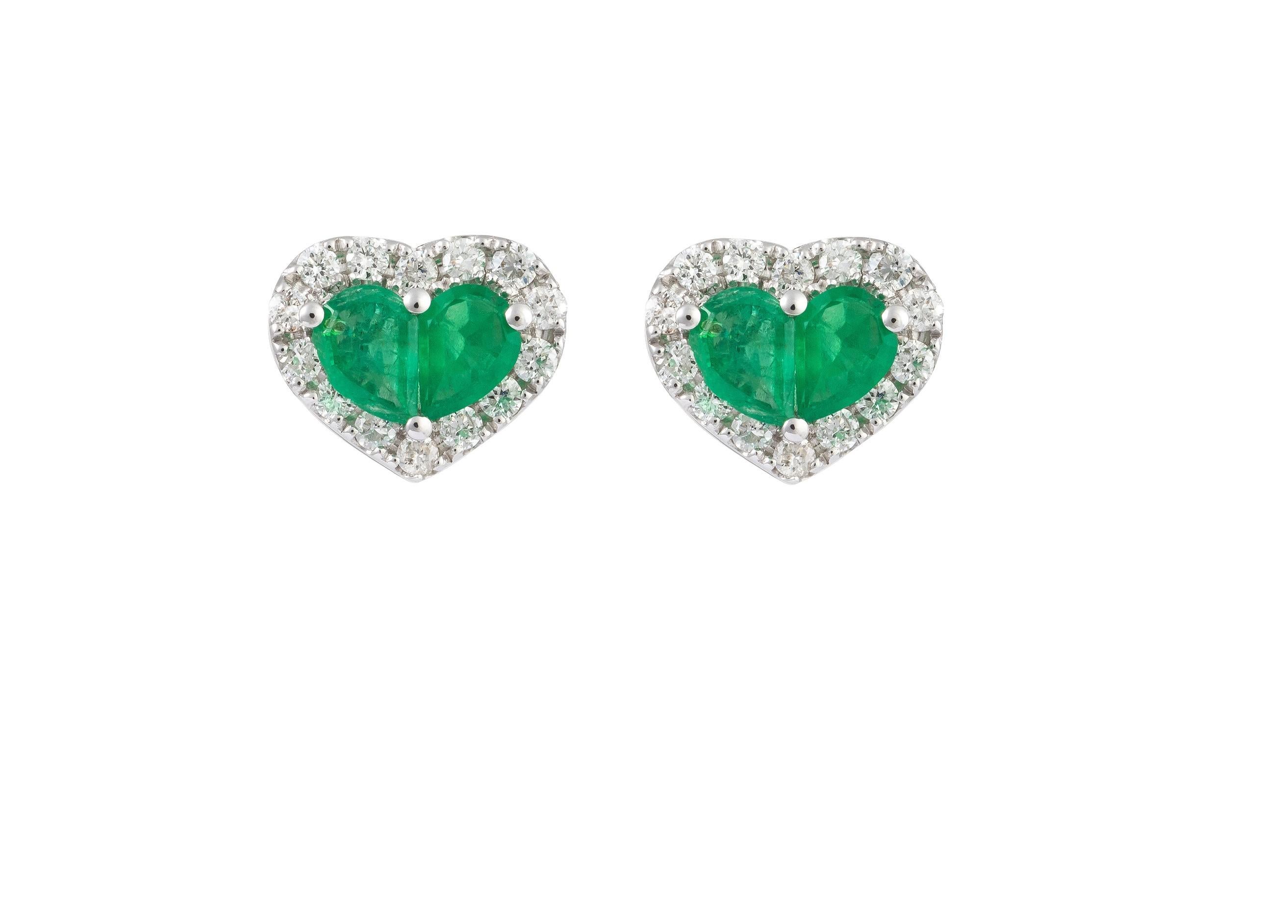 The Following Item we are offering is a Rare Important Radiant 18KT Gold Large Rare Gorgeous Fancy Green Emerald and Diamond Heart Stud Earrings. Earrings are comprised of Beautiful Glittering Sapphires and Gorgeous Diamonds!!! T.C.W. Approx 1CT!!!