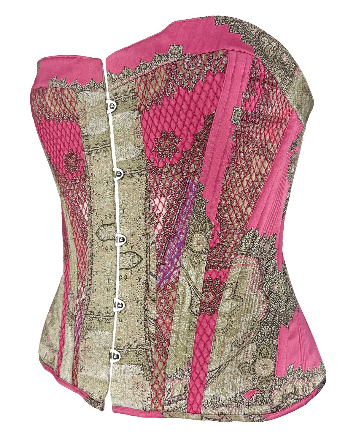 Dieses Bustier-Top von Roberto Cavalli aus dem Jahr 2004 ist neu mit Etikett und zeigt einen lebhaften Paisley-Blumenprint in Rosa- und Brauntönen. Die strukturierte Korsett-Silhouette verfügt über Hakenverschlüsse auf der Vorderseite, innenliegende
