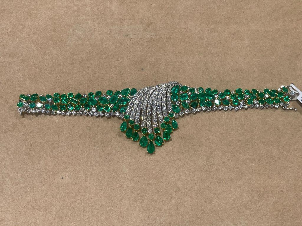 The Following Item we are offering is a Rare Magnificent Radiant 18KT Gold Large Rare Gorgeous Fancy Colombian Emerald and Diamond Bracelet. Bracelet is comprised of Beautiful Glittering Emeralds and Gorgeous Diamonds!!! T.C.W. Approx 32CTS!!! This