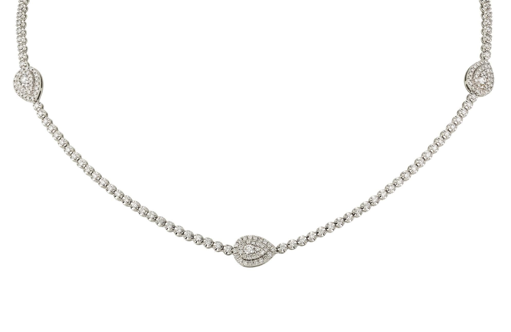 The Following Item we are offering is this Rare Important Radiant 18KT Gold Gorgeous Glittering and Sparkling Magnificent Fancy Pear Shaped and Round Diamond Necklace. Necklace Contains approx over 3.50CTS of Beautiful Fancy Pear and Round