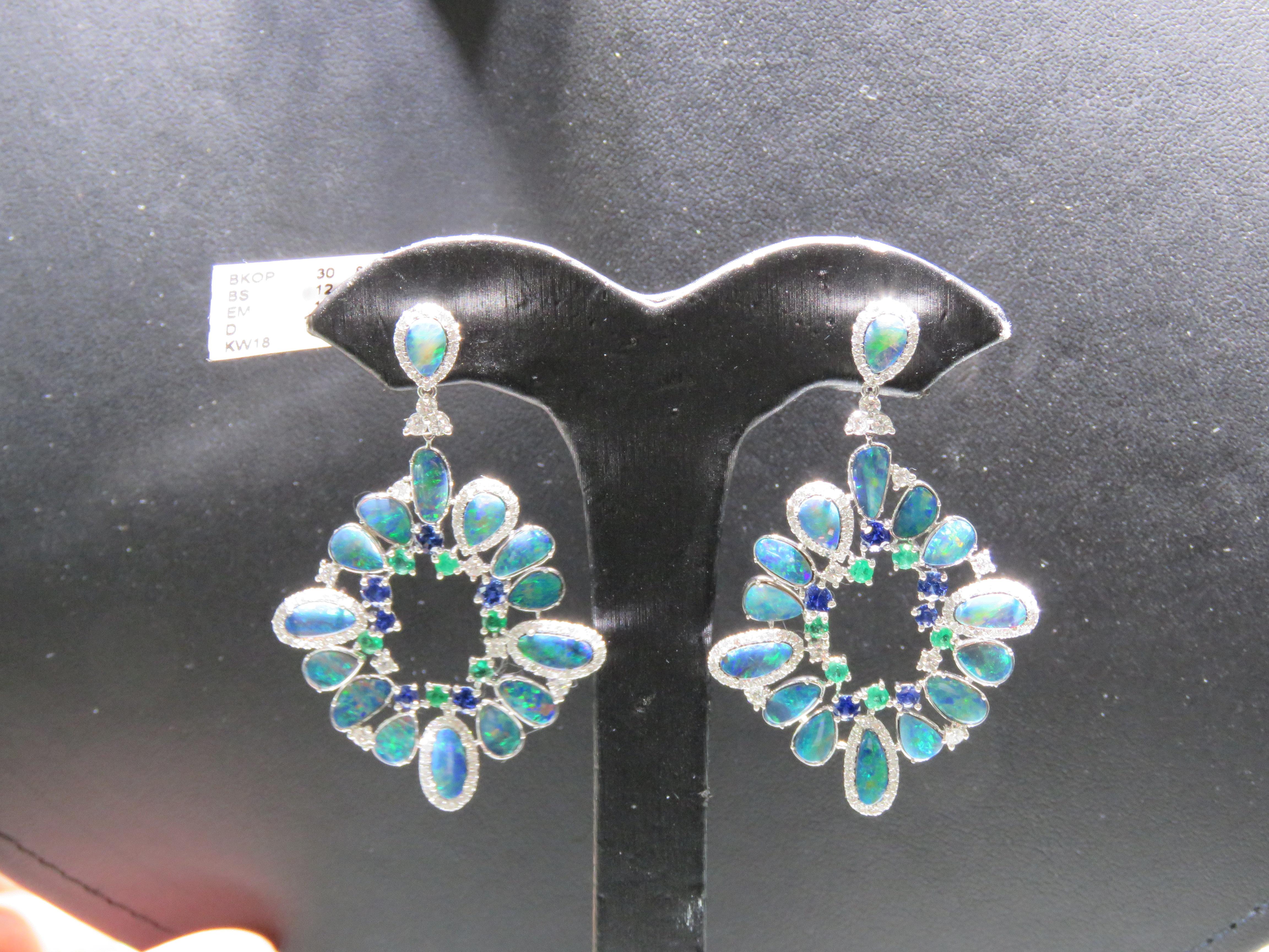 The Following Items we are offering is a Rare Important Radiant Pair of 18KT Gold Glistening Magnificent Large Fiery Black Opal Gorgeous Sapphire and Emerald, and Glittering Diamond Earrings. Stones are Very Clean and Extremely Fine! Approx