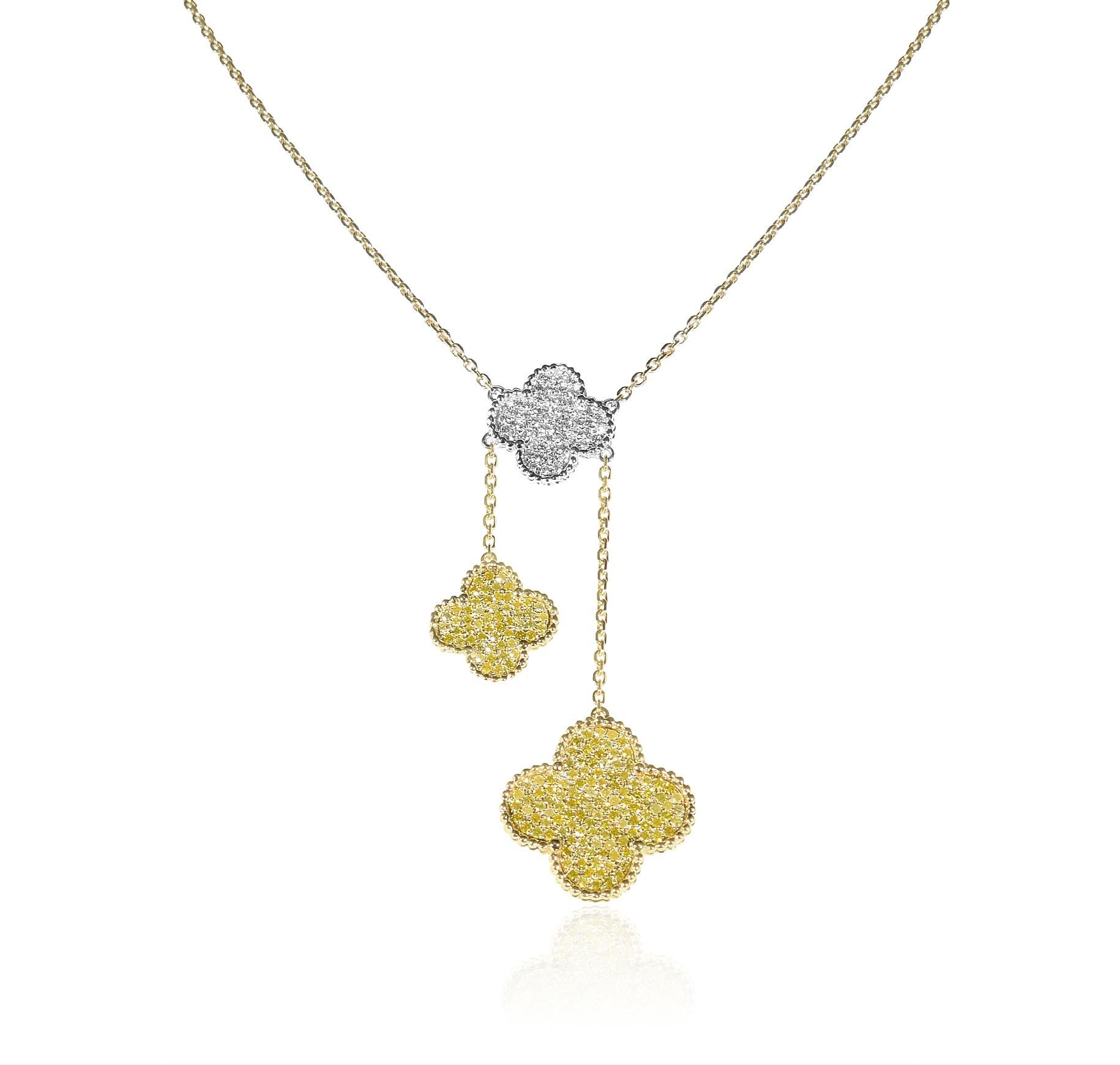 The Following Item we are offering is A Rare 18KT Gold Fancy Large Fancy Double Yellow Diamond Clover and White Diamond Clover Necklace. Necklace is comprised of Finely Set Glittering Gorgeous Fancy Yellow Diamonds and White Diamonds forming