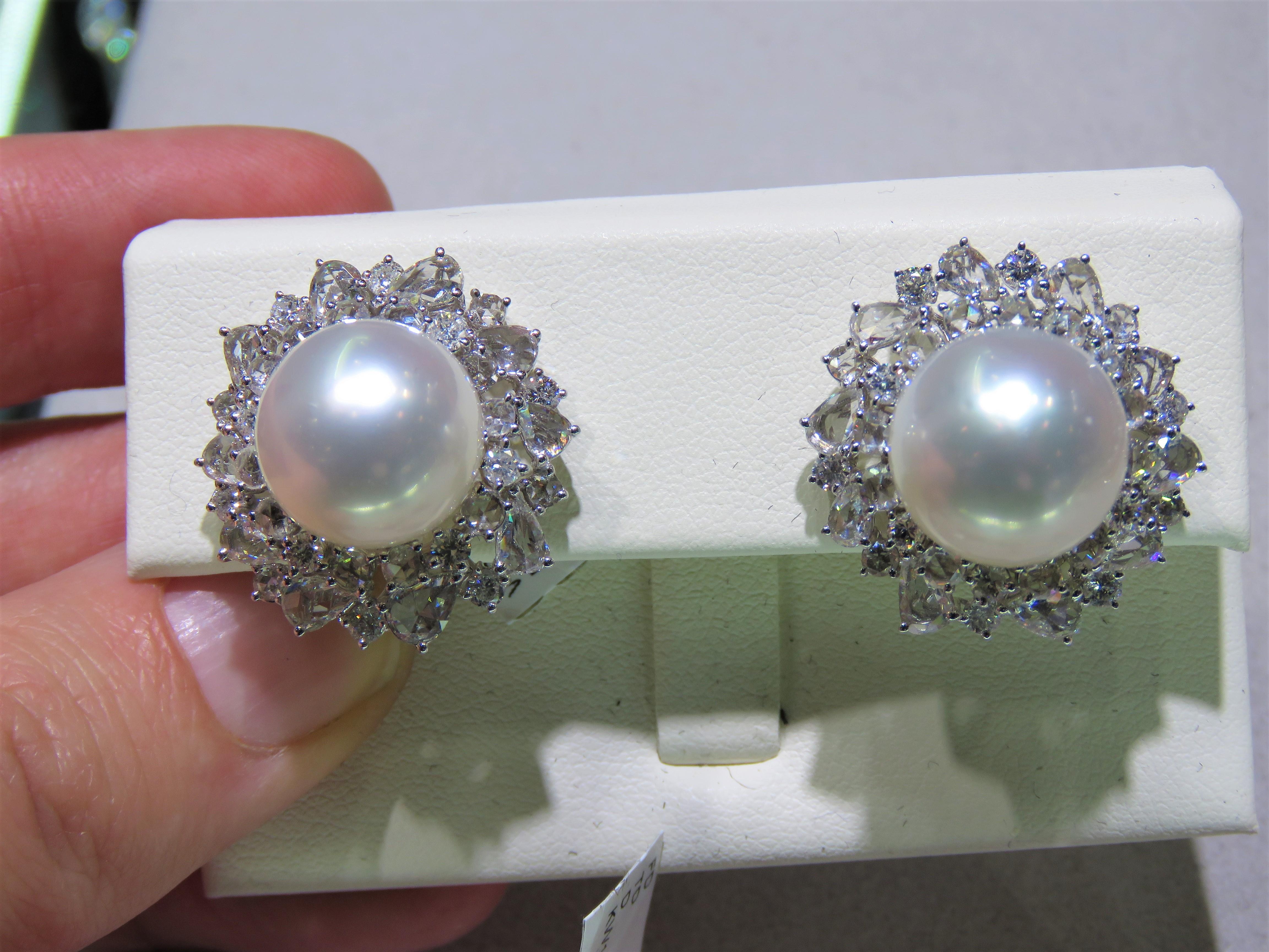 The Following Item we are offering are these Extremely Rare Beautiful 18KT Gold Fine Large Fancy South Sea White Pearl and Diamond Earrings. Each Earring features Gorgeous Glittering Diamonds adorned by a Magnificent Fine Fancy Large South Sea