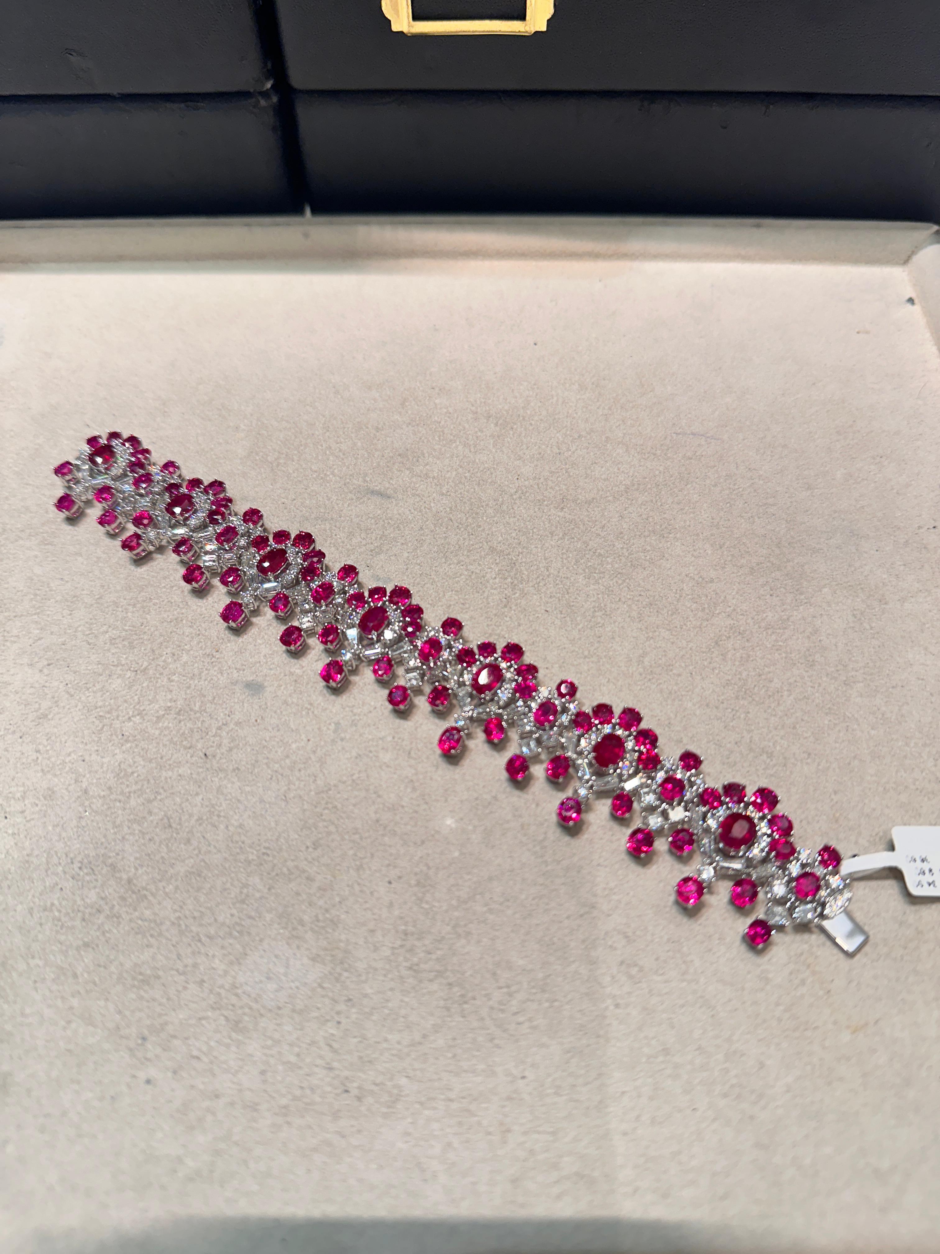 The Following Item we are offering is this Rare Important Radiant 18KT Gold and Platinum Gorgeous Glittering and Sparkling Magnificent Fancy Rare Natural Burmese Ruby and Diamond Bracelet. Bracelet contains approx 45CTS of Beautiful Fancy Burmese