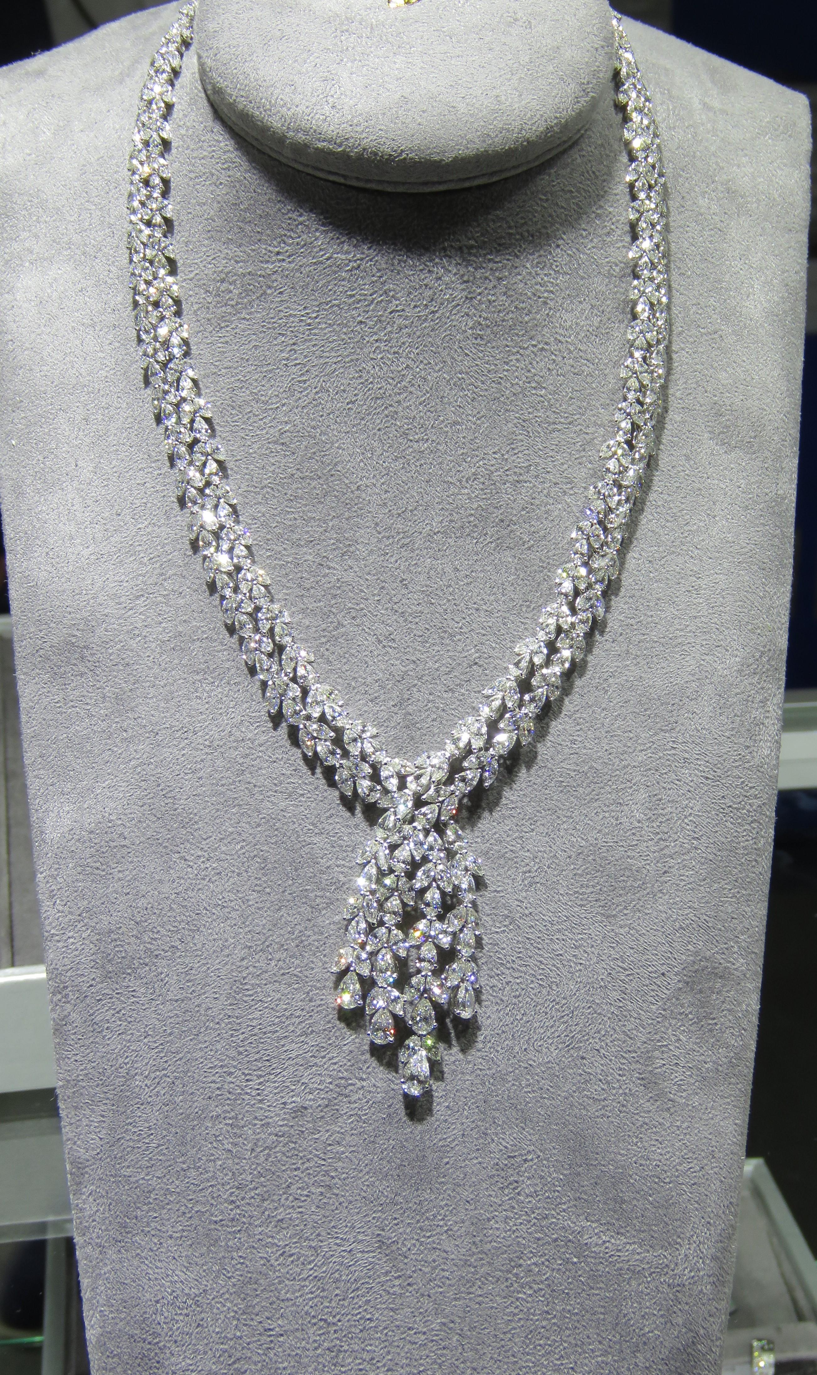 The Following Item we are offering is this Rare Important Radiant 18KT Gold Gorgeous Glittering and Sparkling Magnificent Fancy Diamond Drop Necklace. Necklace contains approx 34CTS of Beautiful Glittering Diamonds all set in 18KT Gold!!  Stones are