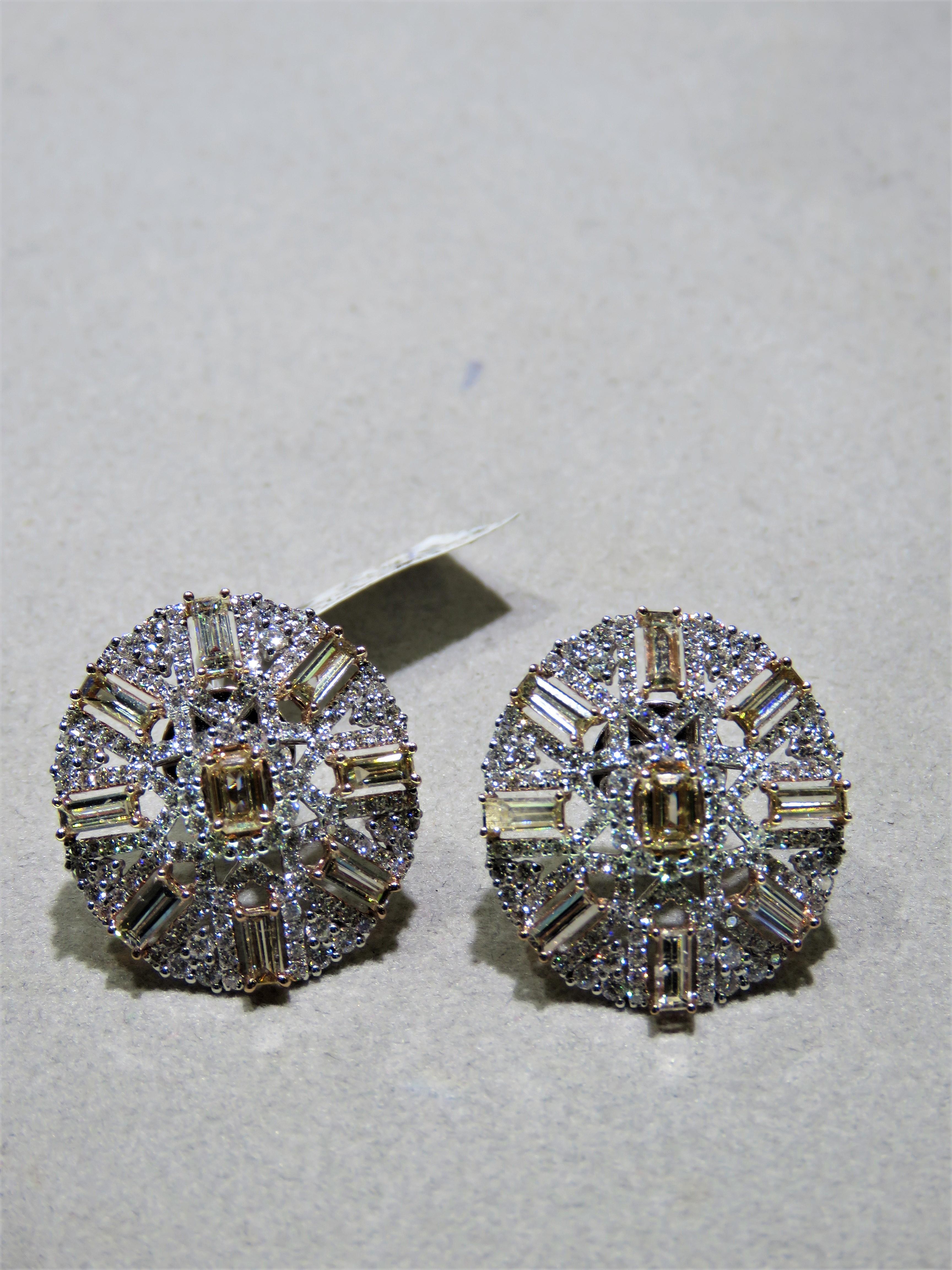 The Following Item we are offering are these Extremely Rare Beautiful 18KT Gold Fine Large Fancy Cognac Diamond and White Diamond Earrings. Each Earring features Rare Gorgeous Glittering Fancy Cognac Large Baguette Diamonds adorned with Sparkling