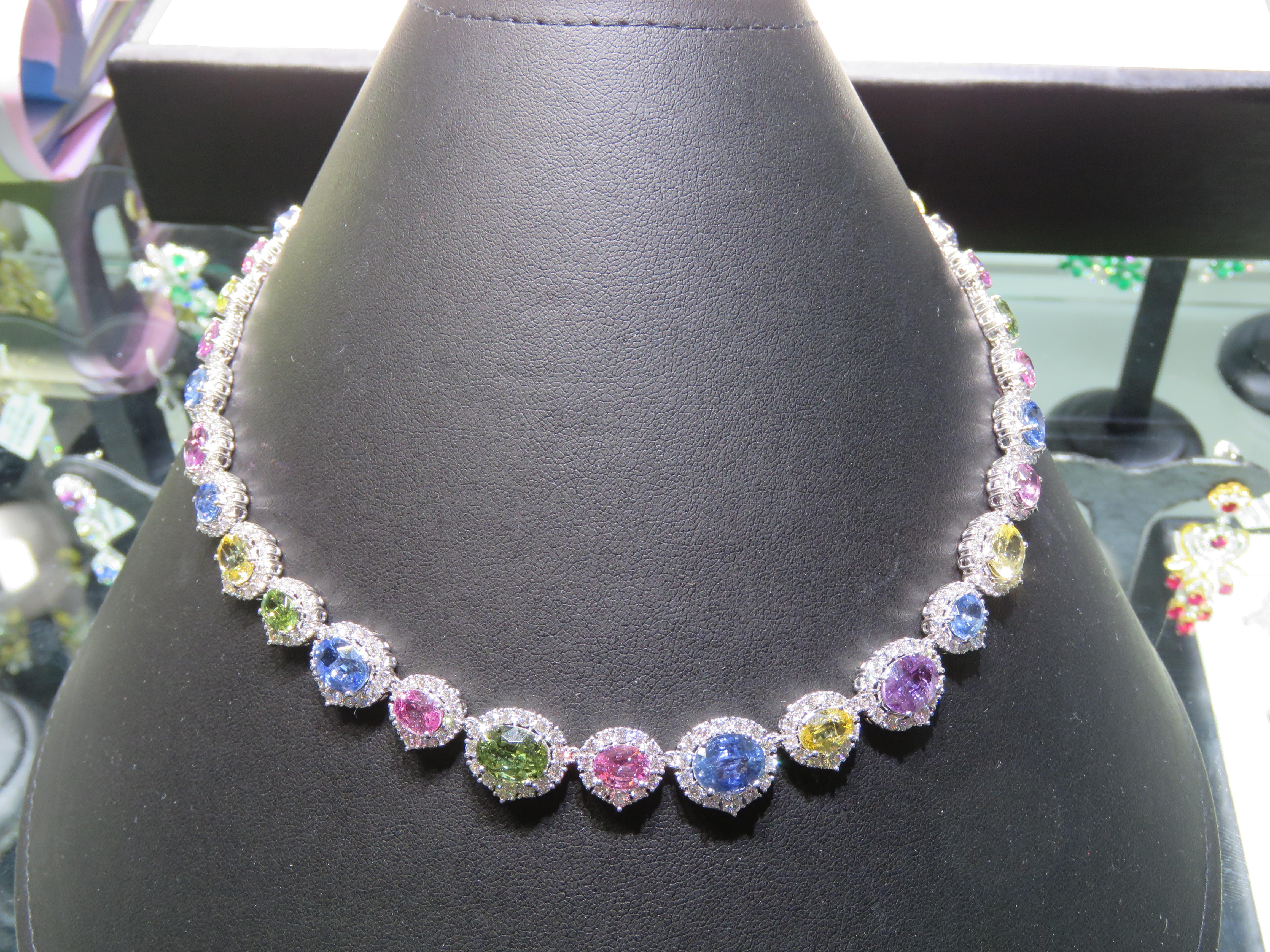 The Following Items we are offering is a Rare Important Gorgeous 18KT White Gold Exquisite Glittering Natural Fancy Colored Sapphire Diamond Necklace!!!! Necklace features Outstanding Shimmering Gorgeous Extremely Rare Large Fancy Multi Colored