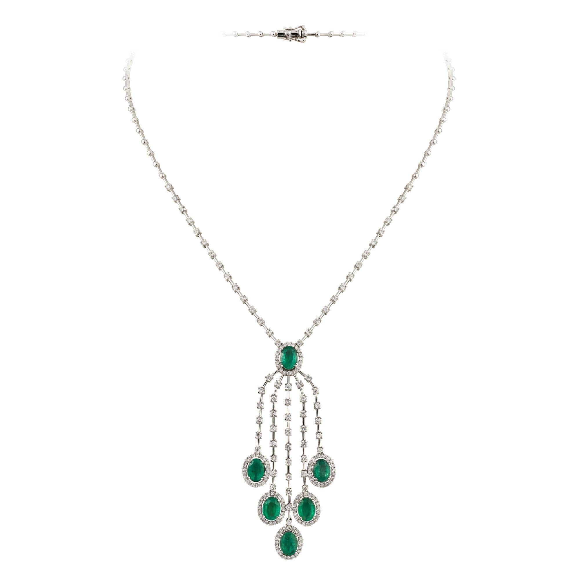 A Rare 18KT White Gold Emerald Diamond Necklace. Necklace is comprised of Finely Set Glittering Gorgeous Emerald Drop Necklace adorned with Sparkling Diamonds!!! The Emeralds and Diamonds are of Exquisite and Fine Quality. T.C.W. approx 9CTS!!! This