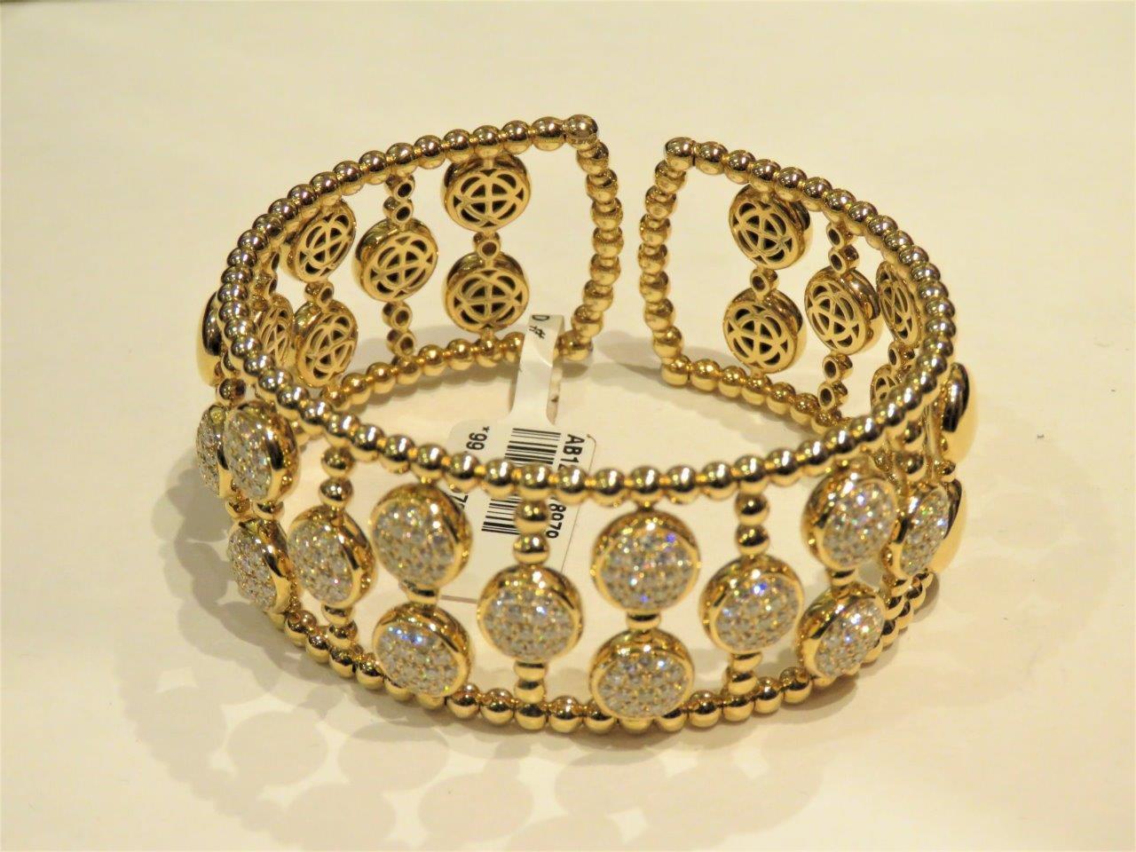 The Following Items we are offering is a Rare Important Estate Radiant 18KT Gold Large Diamond Gold Beaded Bangle Cuff Bracelet. Bangle is Beautifully comprised of Gorgeous Natural Fancy Diamonds!!! T.C.W approx 2 3/4CTS. Original Price: $25,000.
