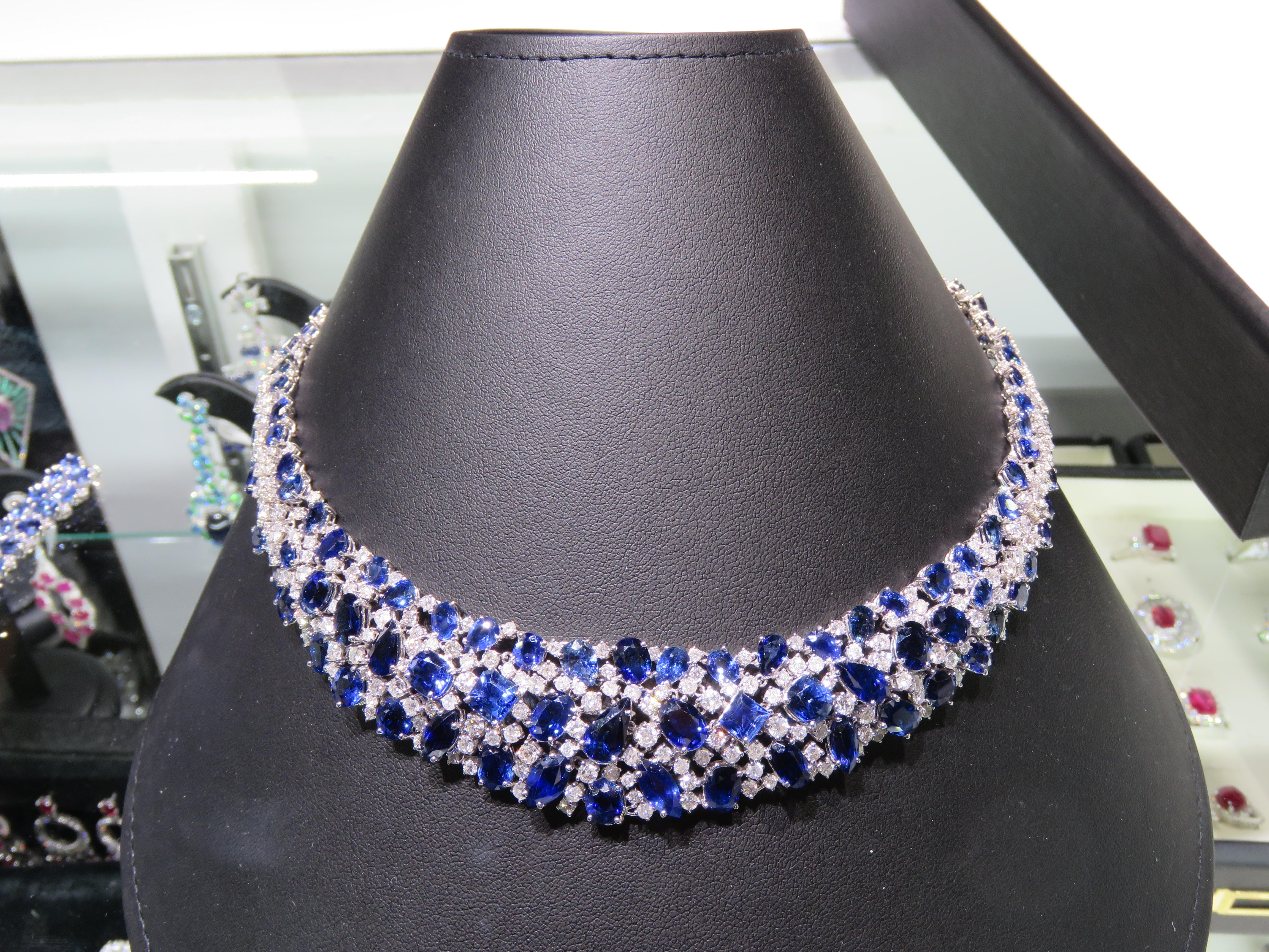 A Rare 18KT White Gold Ceylon Sapphire Diamond Necklace. Necklace is comprised of Finely Set Glittering Gorgeous Ceylon Sapphire Bracelet and adorned with Sparkling Round Diamonds!! T.C.W. approx 90CTS!!! This Gorgeous Necklace is a Sample Piece