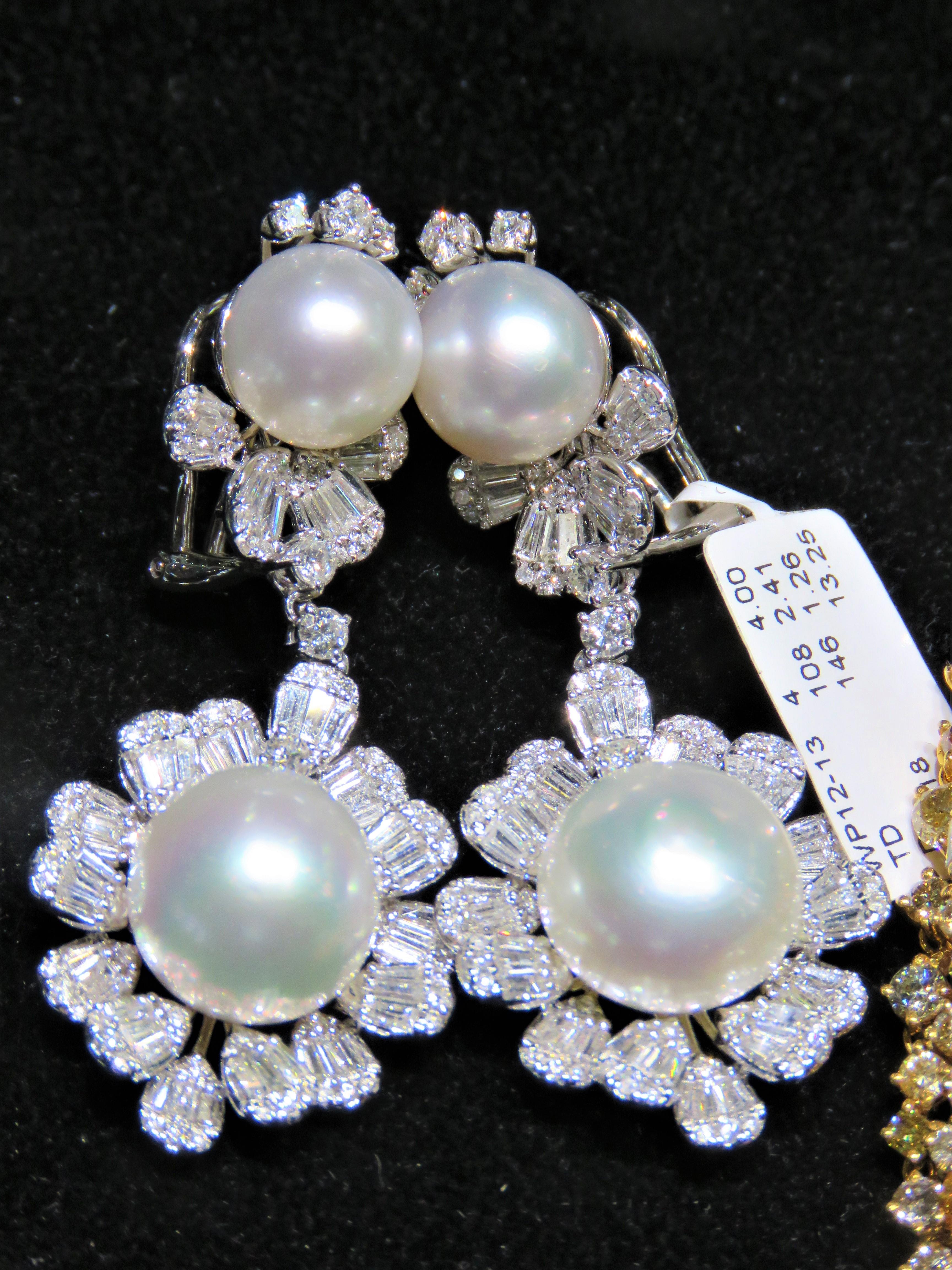 The Following Item we are offering is this Extremely Rare Beautiful 18KT Gold Fine Rare Large South Sea Pearl Fancy Diamond Floral Earrings. These Magnificent Earrings are comprised of Rare Fine Large South Sea Pearls with Gorgeous Glittering