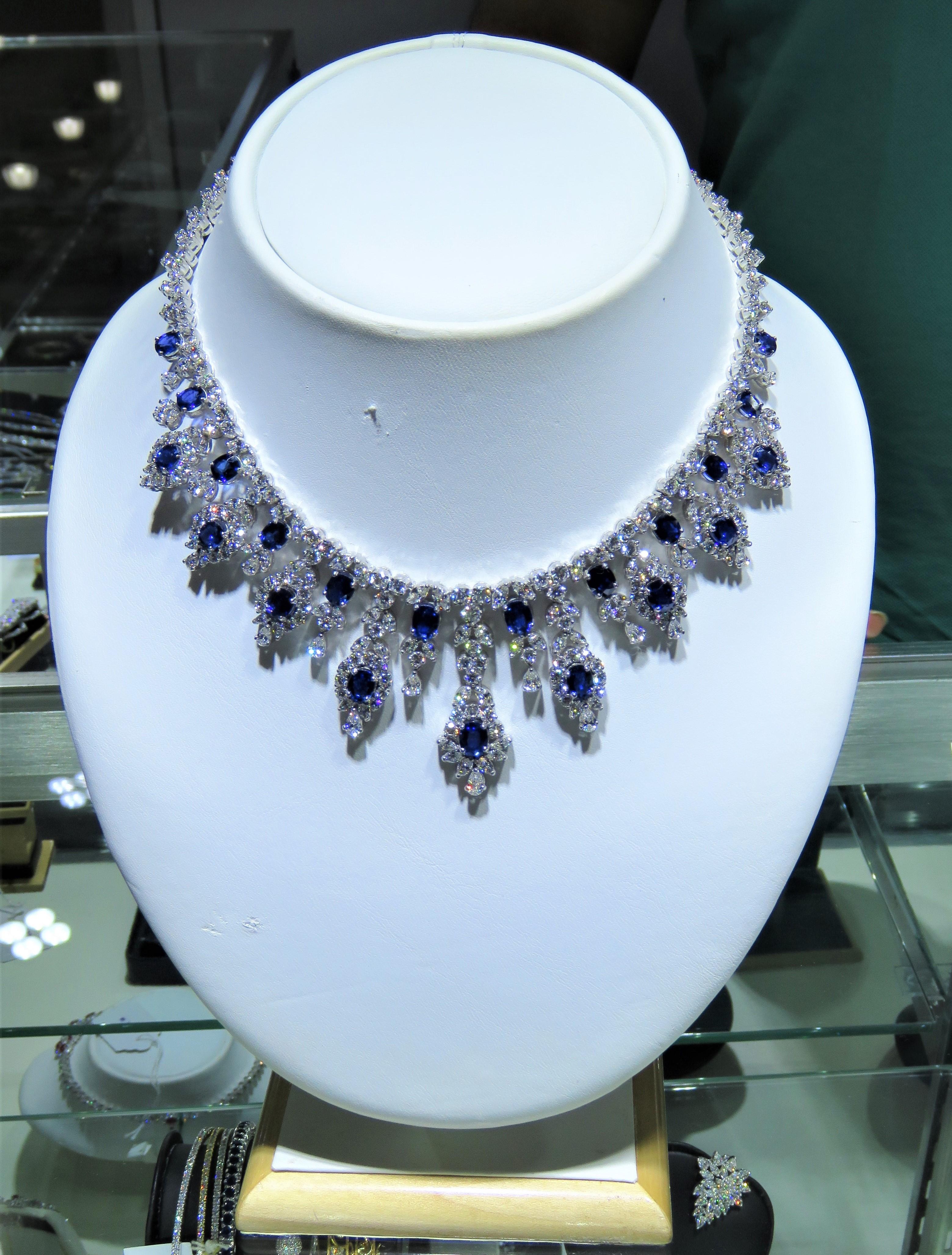 The Following Item we are offering is this Rare Important Radiant 18KT Gold Gorgeous Glittering and Sparkling Magnificent Fancy Sapphires and Diamond Fringe Necklace. Necklace contains approx 52CTS of Beautiful Rare Fancy Ceylon Sapphires and