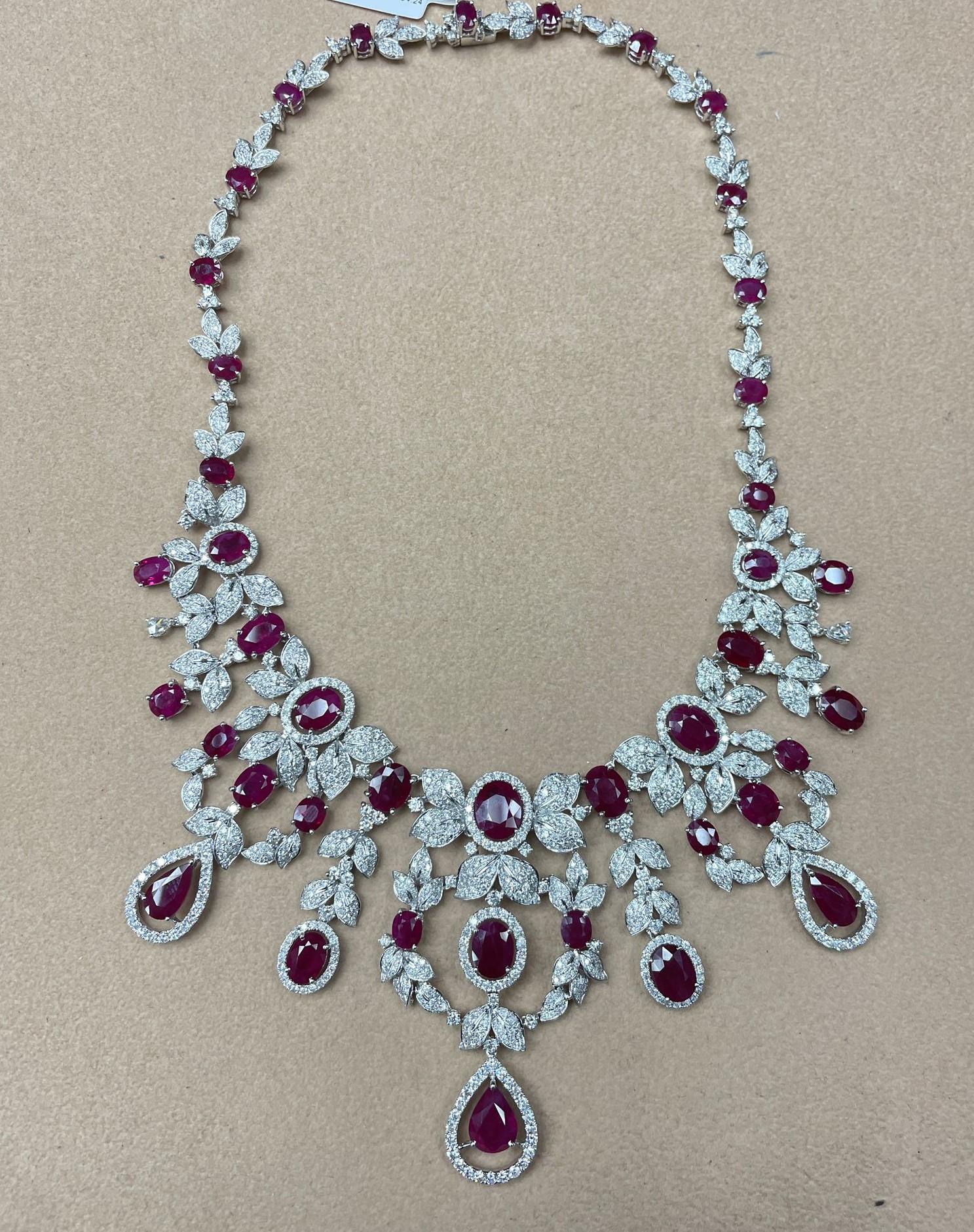 The Following Items we are offering is a Rare Important Radiant 18KT White Gold Fancy Gorgeous Glistening Diamond and Ruby Necklace consisting of Magnificent Rubies and Diamonds. Each Strand contains Spectacular Rubies and Diamonds. Beautifully done