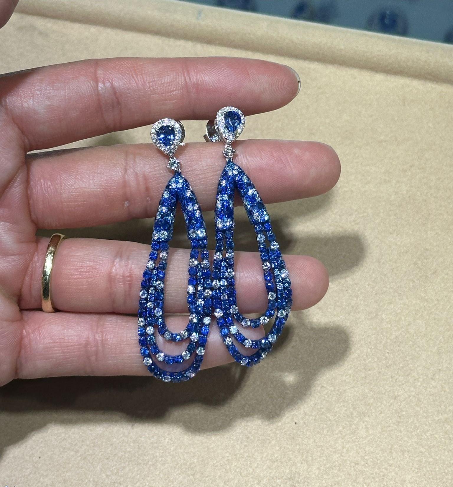The Following Items we are offering is a Rare Important Spectacular and Brilliant White Gold Large Gorgeous Fancy Blue Sapphire Diamond Draped Dangle Earrings. Earrings consists of Rare Fine Magnificent Glittering Blue Sapphires and Gorgeous