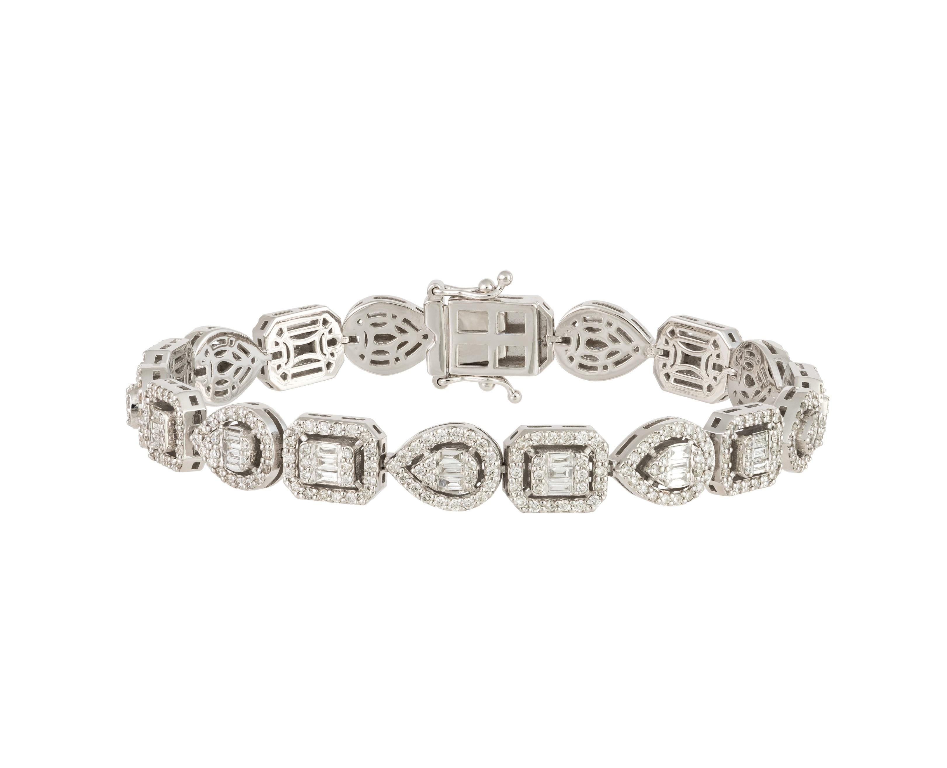 The Following Item we are offering is this Beautiful Rare Important 18KT White Gold Large Glittering Fancy Shaped Diamond Tennis Bracelet. Bracelet is comprised of approx 3.50CTS Magnificent Rare Gorgeous Fancy Glittering Diamonds!!! The Diamonds