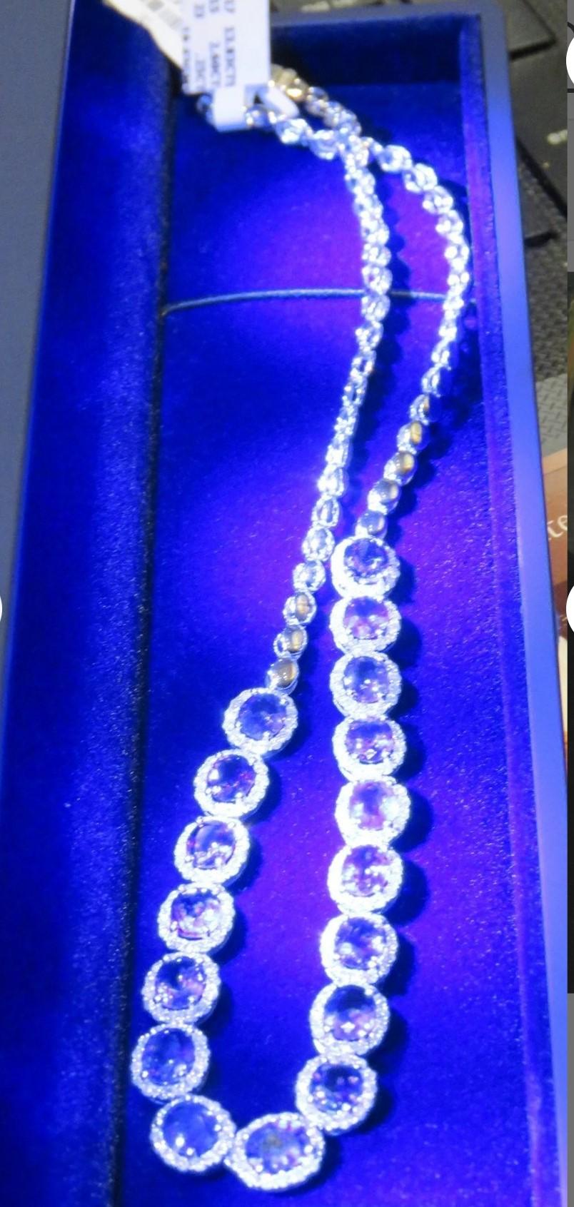 The Following Item we are offering is this Beautiful Rare Important 18KT Gold Gorgeous Glittering Ceylon Blue Sapphire and Sparkling White Diamond Necklace. Necklace is comprised of Magnificent Large Magnificent Oval Cut Sapphires surrounded by a