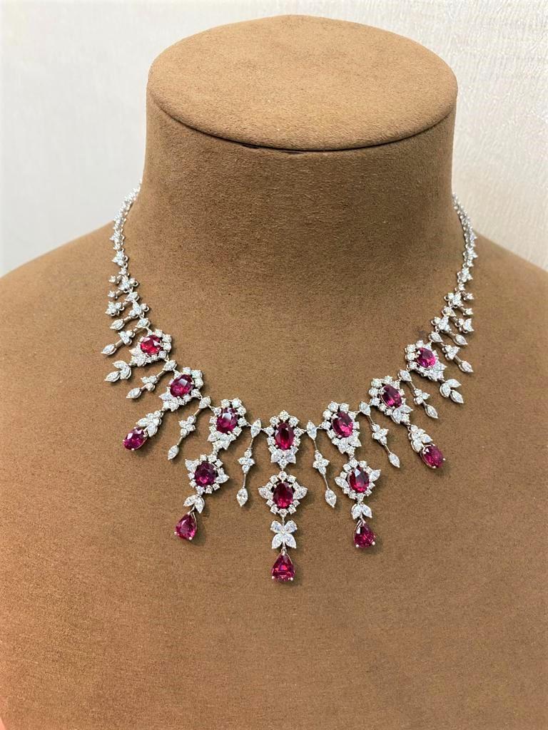 The Following Item we are offering is this Rare Important Radiant 18KT Gold Gorgeous Glittering and Sparkling Magnificent Fancy Unheated Natural Ruby and Diamond Fringe Necklace. Necklace contains over 30CTS of Beautiful Fancy Natural Unheated