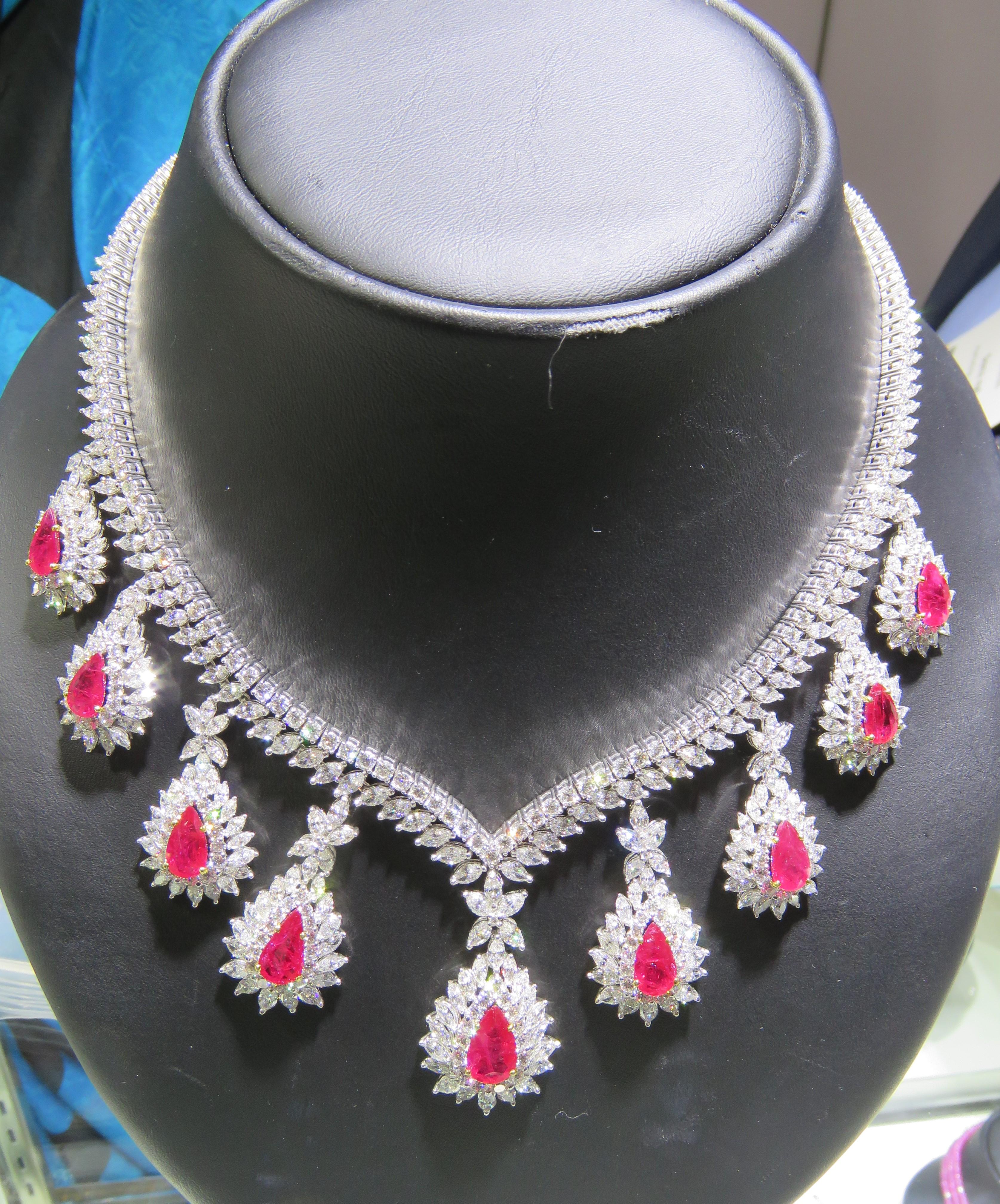 The Following Item we are offering is this Rare Important Radiant 18KT Gold Gorgeous Glittering and Sparkling Magnificent Fancy Rare Important Ruby and Diamond Necklace. Necklace contains approx 60CTS of Beautiful Fancy Rubies and Diamonds!!! Stones