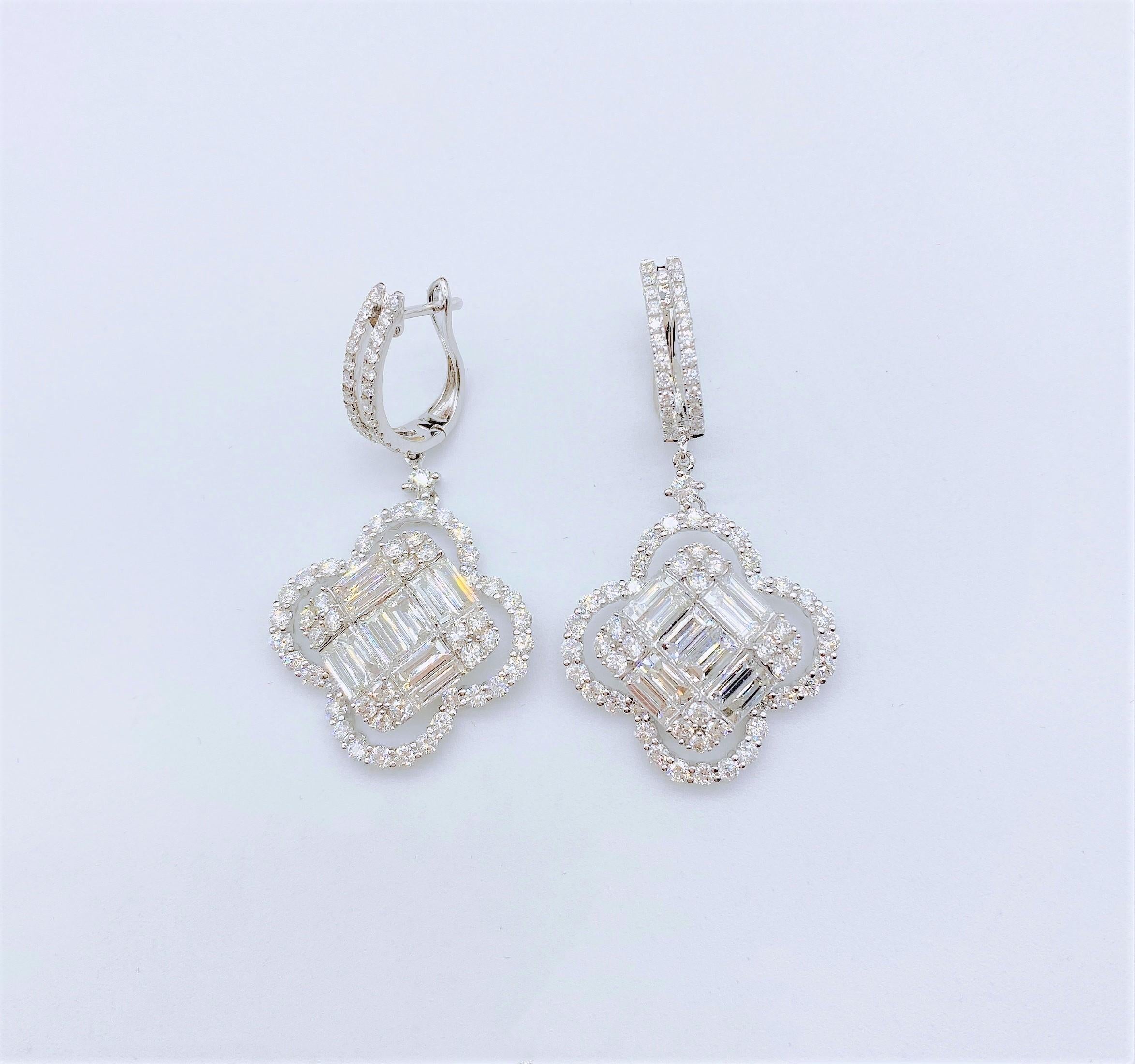The Following Item we are offering are these Extremely Rare Beautiful 18KT Gold Fine Large Fancy Diamond Earrings comprised with approx 6CTS Carats of Fine Gorgeous Glittering Diamonds in the form of Alhambra Clovers!! The Diamonds are of Exquisite