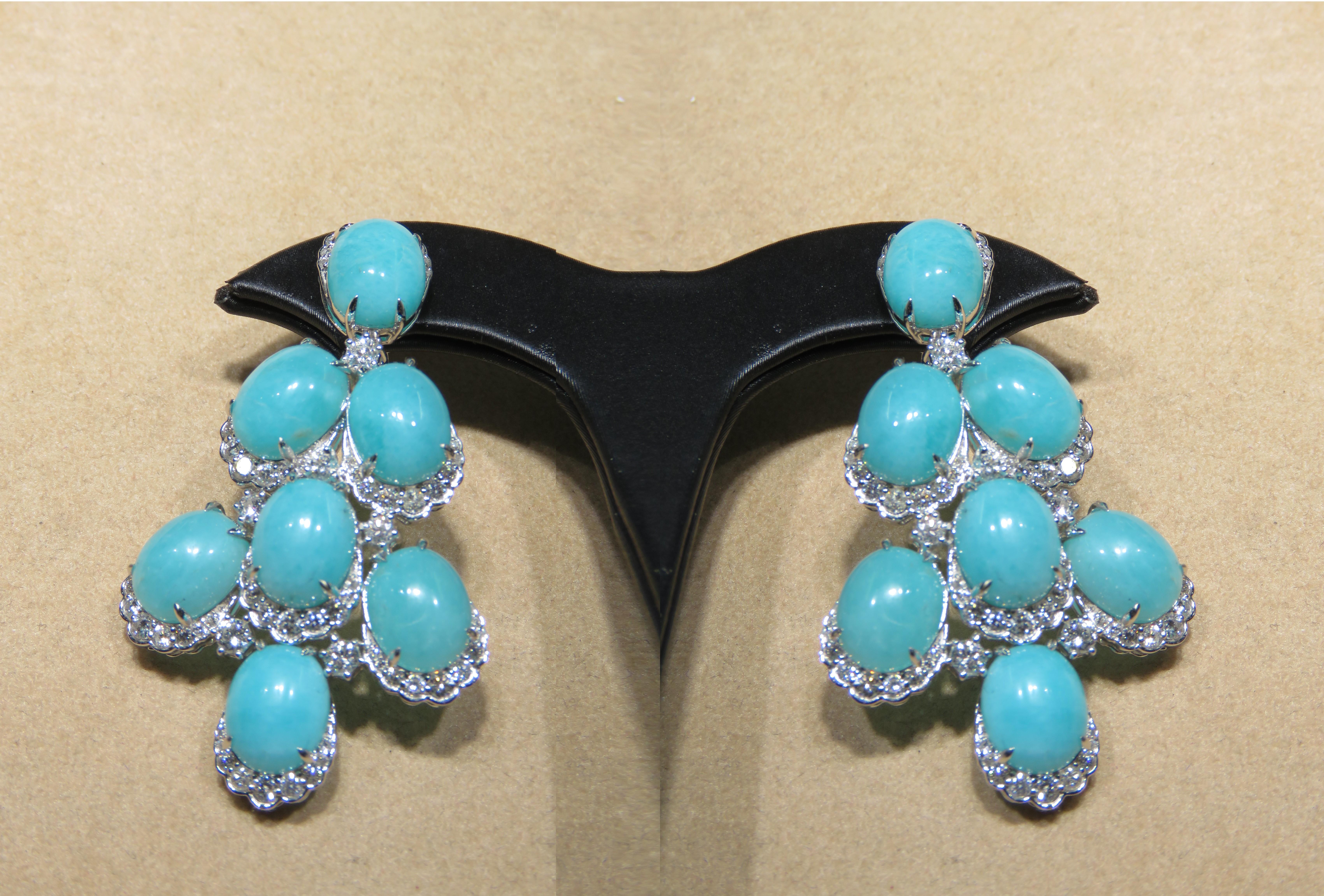 The Following Item we are offering are these Extremely Rare Beautiful 18KT Gold Fine Large Fancy Amazonite Diamond Dangle Earrings. Each Earring features Rare Gorgeous Glittering Fancy Amazonite Gemstones and Fancy Glittering Sparkling White
