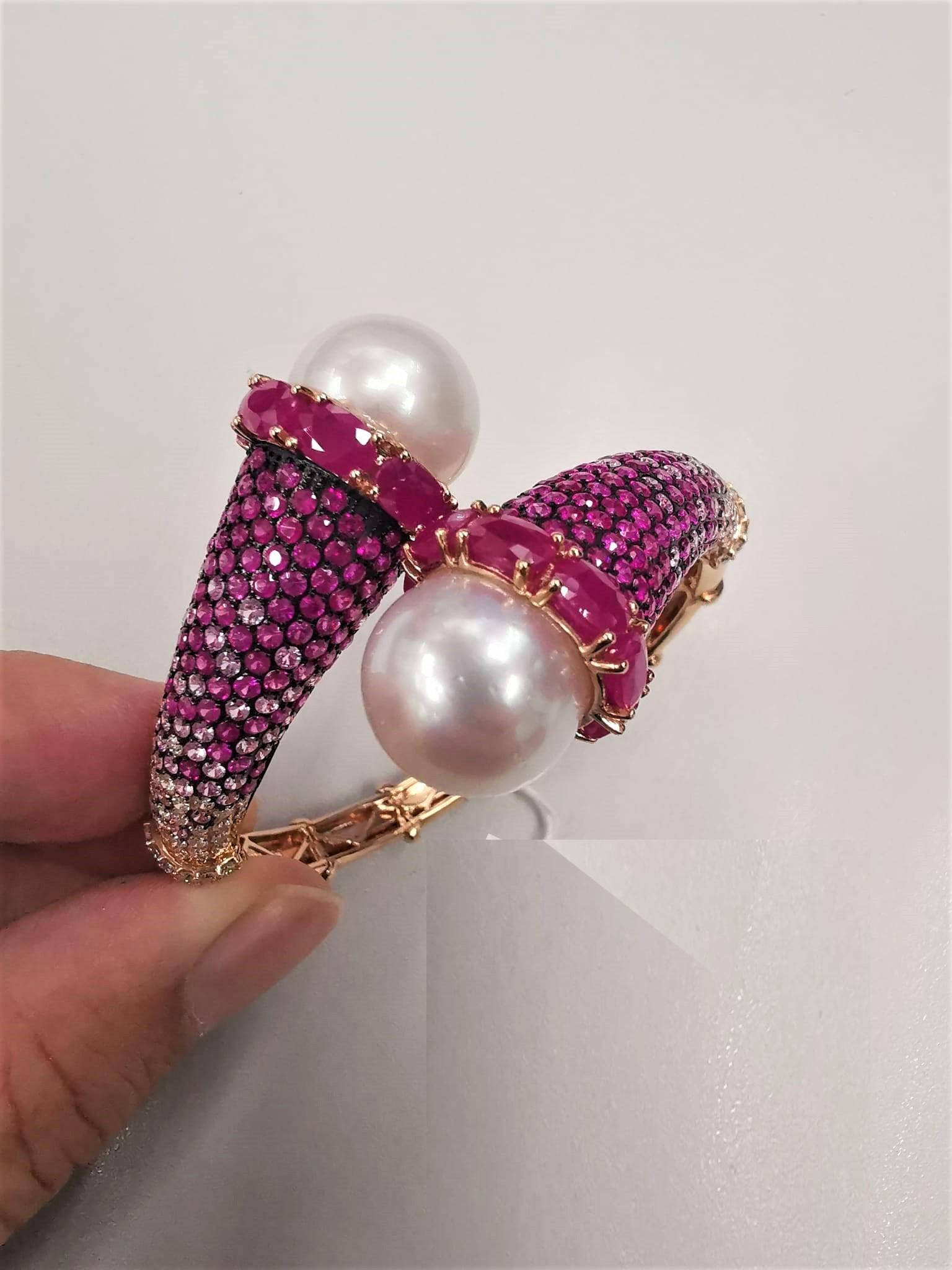 The Following Item we are offering is this Extremely Rare Beautiful 18KT Gold Fine Fancy Rare Large South Sea Pearl Ruby Sapphire Diamond Bangle Bracelet. This Magnificent Bangle is comprised of Rare Fine Large South Sea Pearls and Round Gorgeous