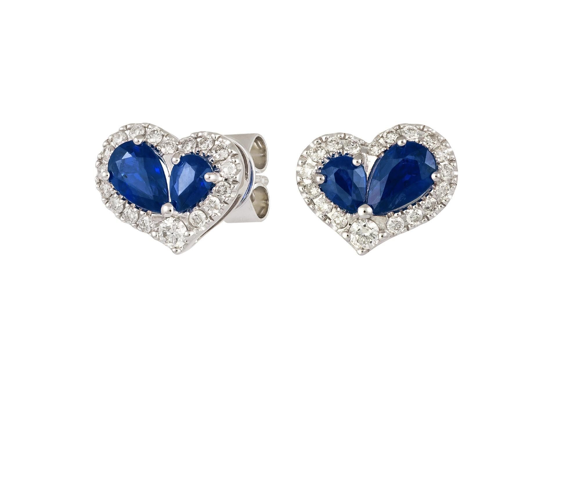 The Following Item we are offering is a Rare Important Radiant 18KT Gold Large Rare Gorgeous Fancy Blue Sapphire and Diamond Heart Stud Earrings. Earrings are comprised of Beautiful Glittering Sapphires and Gorgeous Diamonds!!! T.C.W. Approx 2CTS!!!