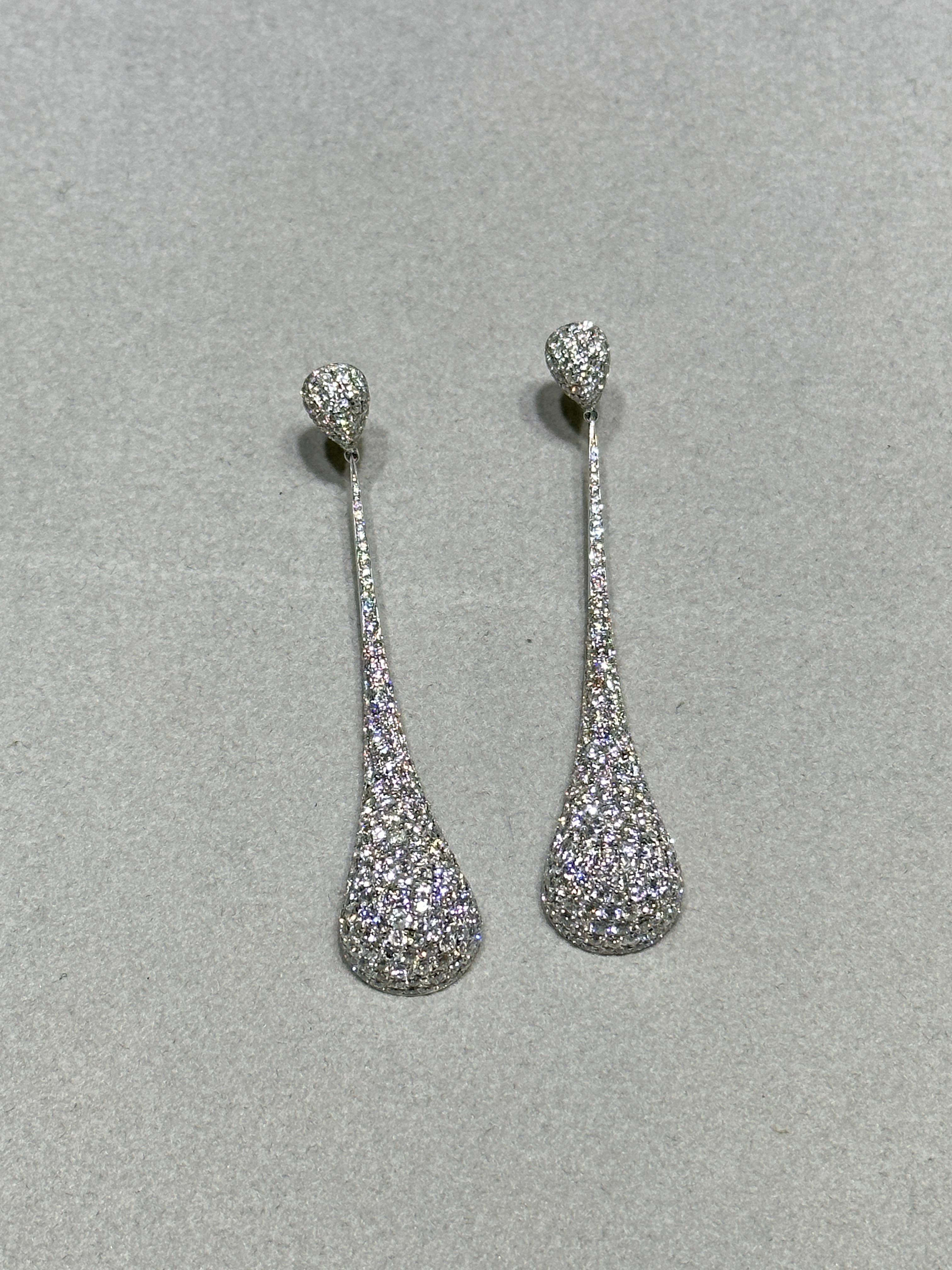 The Following Item we are offering is a Rare Important Radiant 18KT Gold Large Rare Fancy Diamond Dangle Drop Earrings. These Magnificent Rare Fancy Large Diamond Drop Earrings are comprised of Rare Glittering Fancy Round Diamonds.T.C.W. almost
