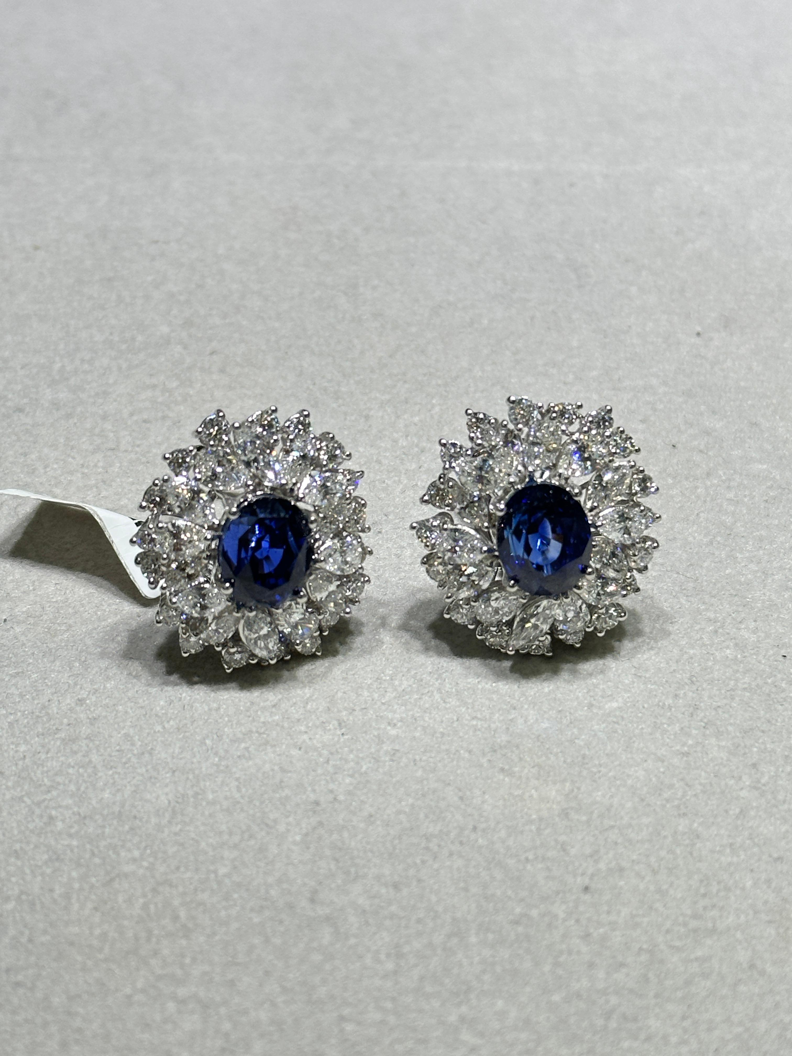 The Following Item we are offering is a Rare Important Radiant 18KT Gold Large Rare Fancy Blue Ceylon Sapphire and Diamond Earrings. Earrings are comprised of Gorgeous Ceylon Blue Sapphires Spectacularly Set in and surrounded by Magnificent