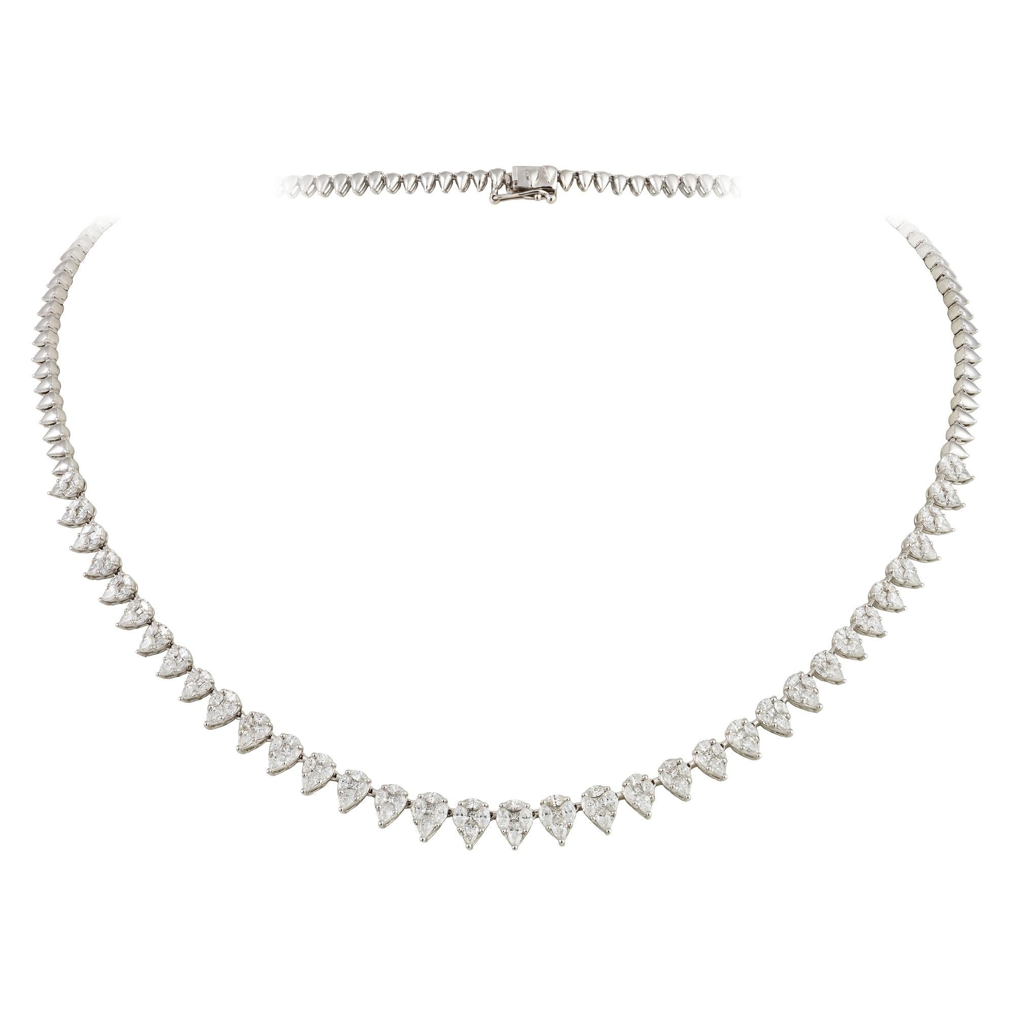 The Following Item we are offering is a Rare 18KT White Gold Triple Flower Diamond Strand Necklace. Necklace is comprised of Finely Set Gorgeous Glittering Diamond in a strand and 3 Large Cluster of Flowers.!! T.C.W. Approx 5.50CTS!! This Gorgeous