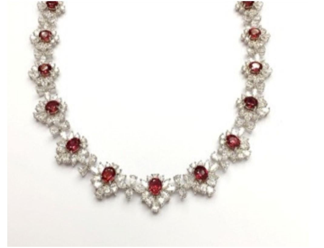 The Following Item we are offering is this Rare Important Radiant 18KT Gold Gorgeous Glittering and Sparkling Magnificent Ruby and Diamond Necklace. Necklace contains approx 33.50CTS of Beautiful Fancy Rubies and Diamonds!!! Stones are Very Clean