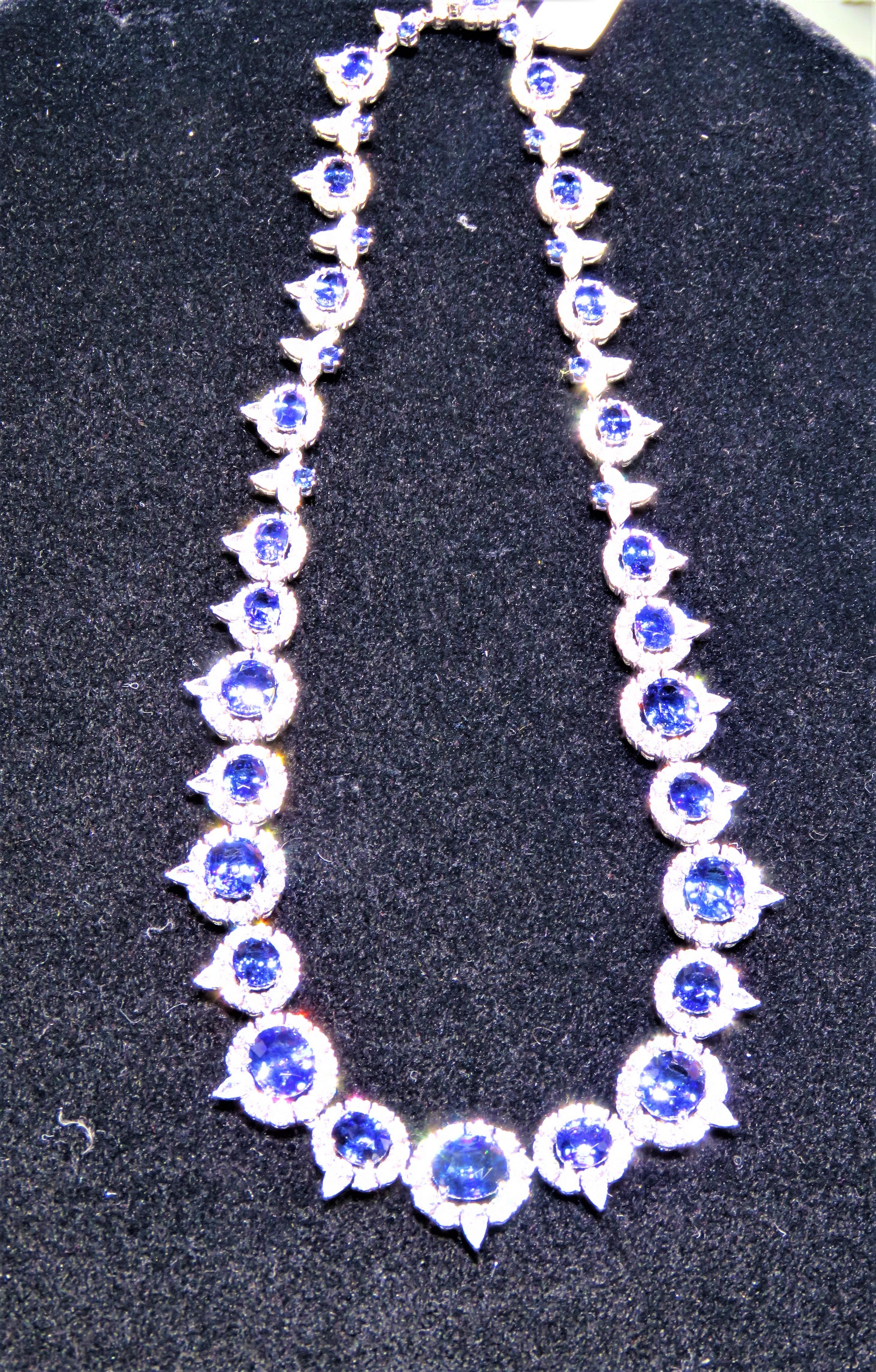 The Following Item we are offering is a Rare Important Estate Radiant Large Rare Fancy GIA Certified 18KT Gold Certified Ceylon Blue Sapphire and Diamond Necklace. Necklace is comprised of Rare Gorgeous Large Blue Sapphires each surrounded by a Halo