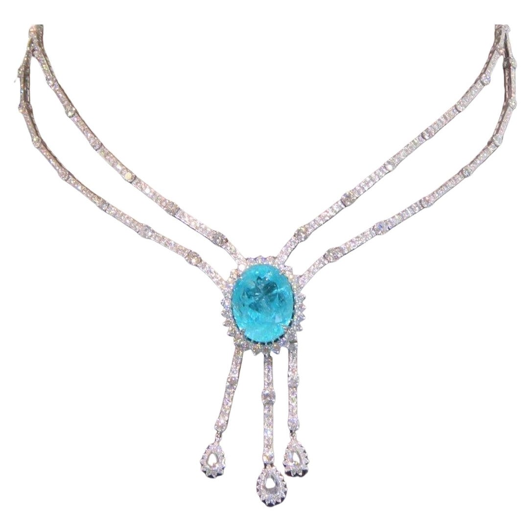 The Following Items we are offering is a Rare Important Gorgeous 18KT White Gold Winston Style Glistening Diamond and Paraiba Tourmaline Necklace!!!! Necklace features Outstanding Multi Shaped Glittering Extremely Rare Fancy Cut Mozambique Paraiba