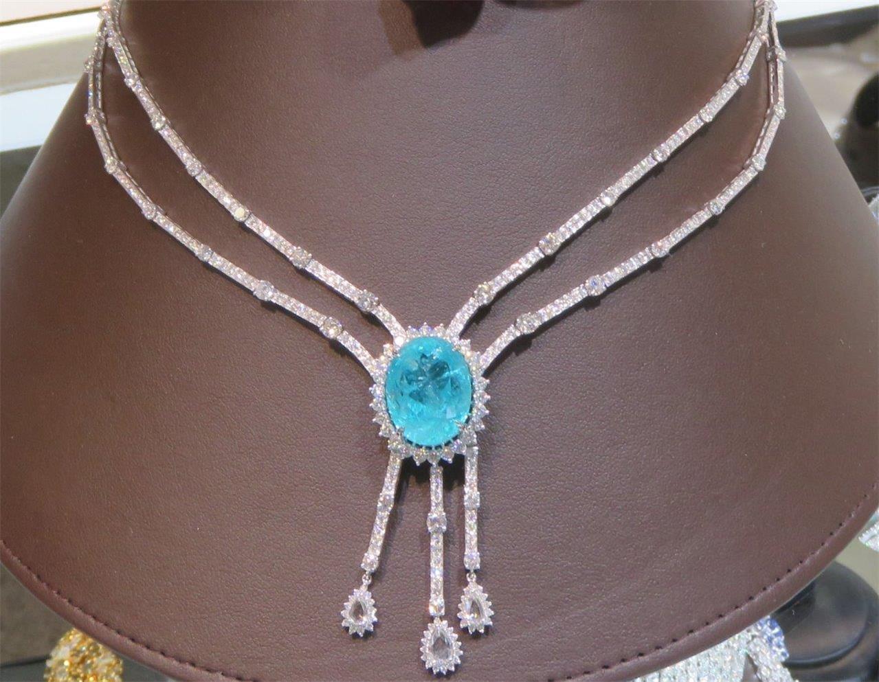 The Following Items we are offering is a Rare Important Gorgeous 18KT White Gold Winston Style Glistening Diamond and Paraiba Tourmaline Necklace!!!! Necklace features Outstanding Multi Shaped Glittering Extremely Rare Fancy Cut Mozambique Paraiba